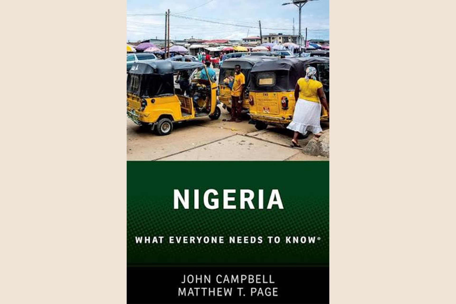 A book cover showing a photograph of rickshaws in Nigeria. The text reads, "Nigeria: What Everyone Needs to Know".