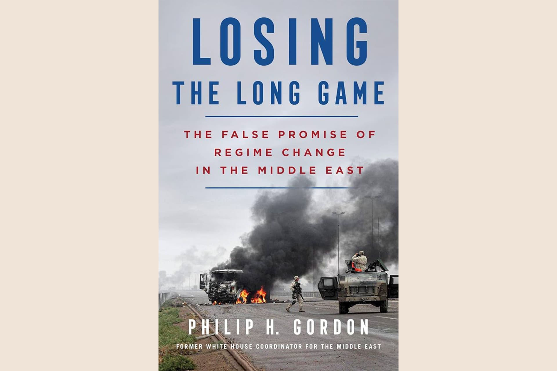 A book cover showing a vehicle on fire and smoke blowing from it. The text reads, "Losing the Long Game: The False Promise of Regime Change in the Middle East".