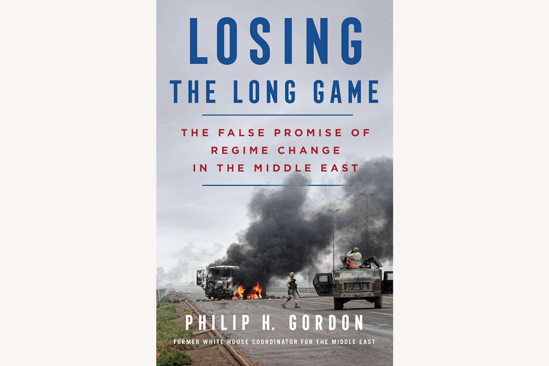 A book cover showing a vehicle on fire and smoke blowing from it. The text reads, "Losing the Long Game: The False Promise of Regime Change in the Middle East".
