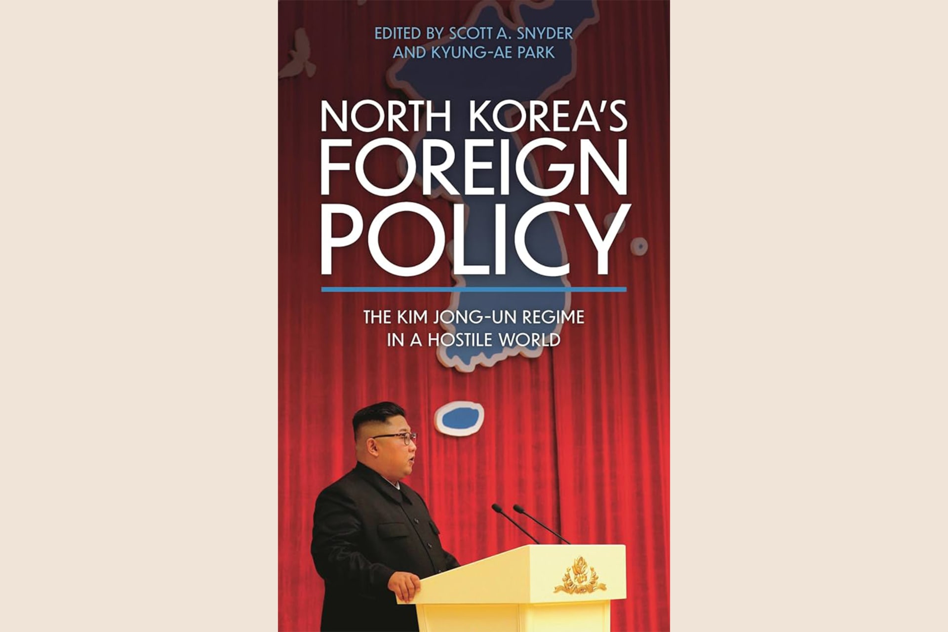 A book cover with an image of Kim Jong-Un giving a speech from a podium. The text reads, "North Korea's Foreign Policy: The Kim Jon-Un Regime in a Hostile World".