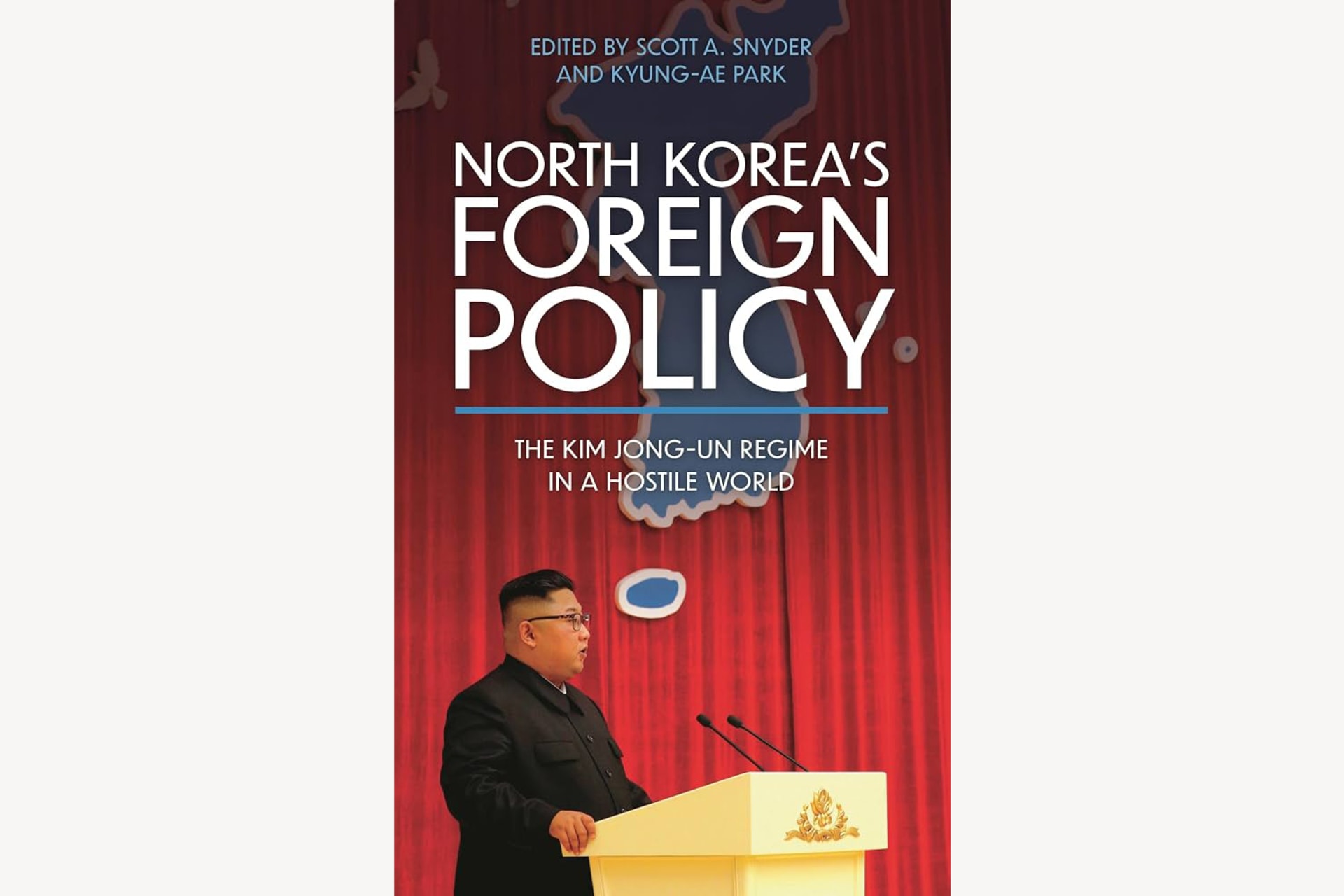 A book cover with an image of Kim Jong-Un giving a speech from a podium. The text reads, "North Korea's Foreign Policy: The Kim Jon-Un Regime in a Hostile World".