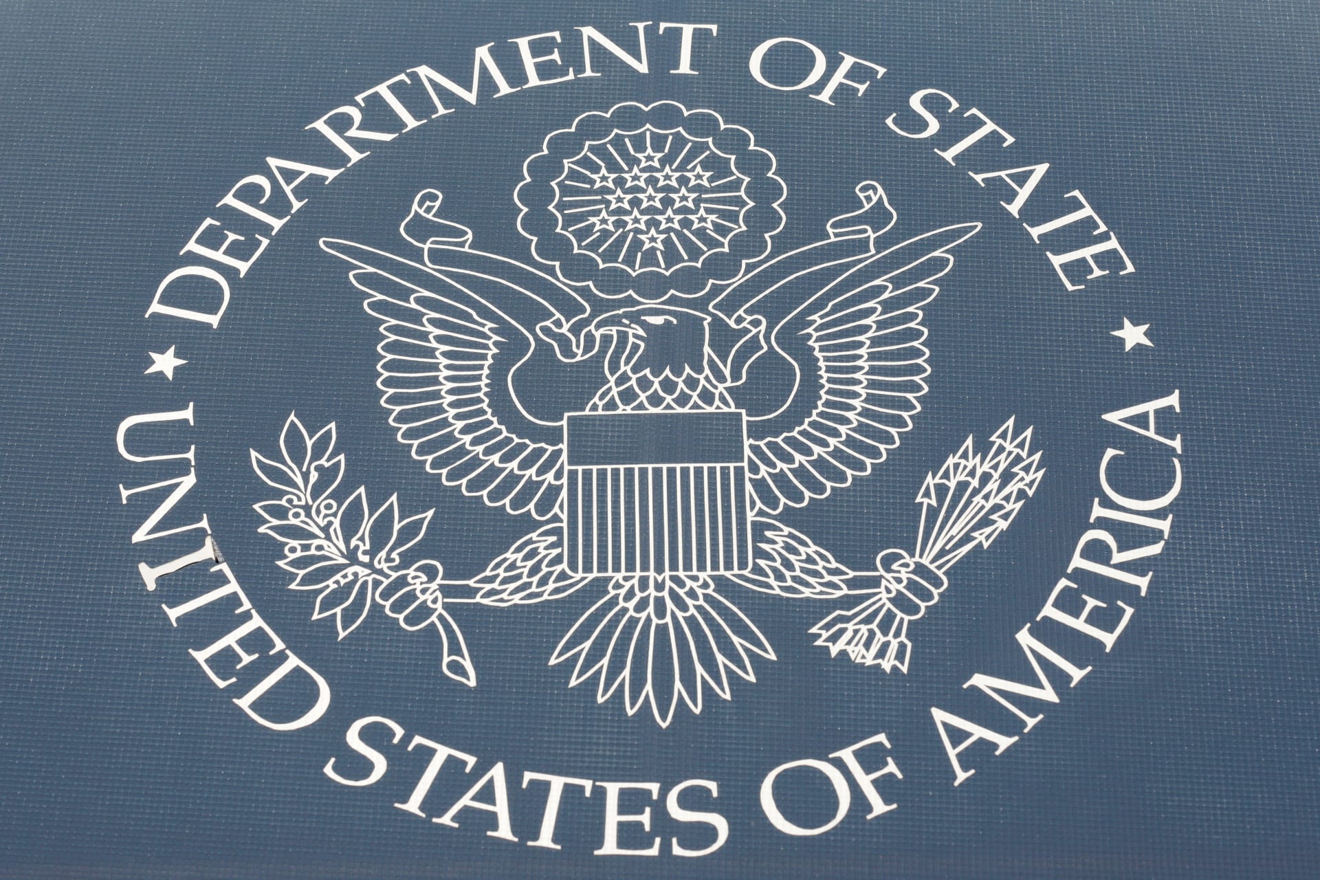 The seal of the United States Department of State is shown in Washington