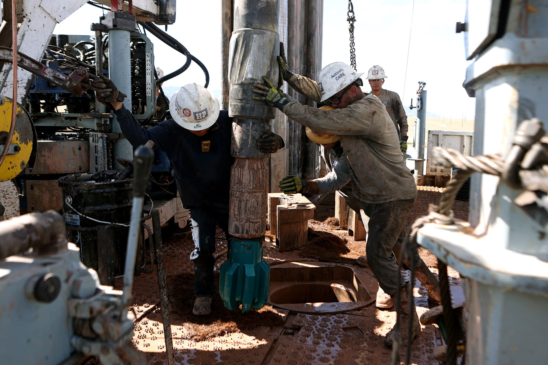 Drillers work on an electric powered drilling platform at the Cape Station geothermal project in Milford, Utah, on June 10, 2025. 