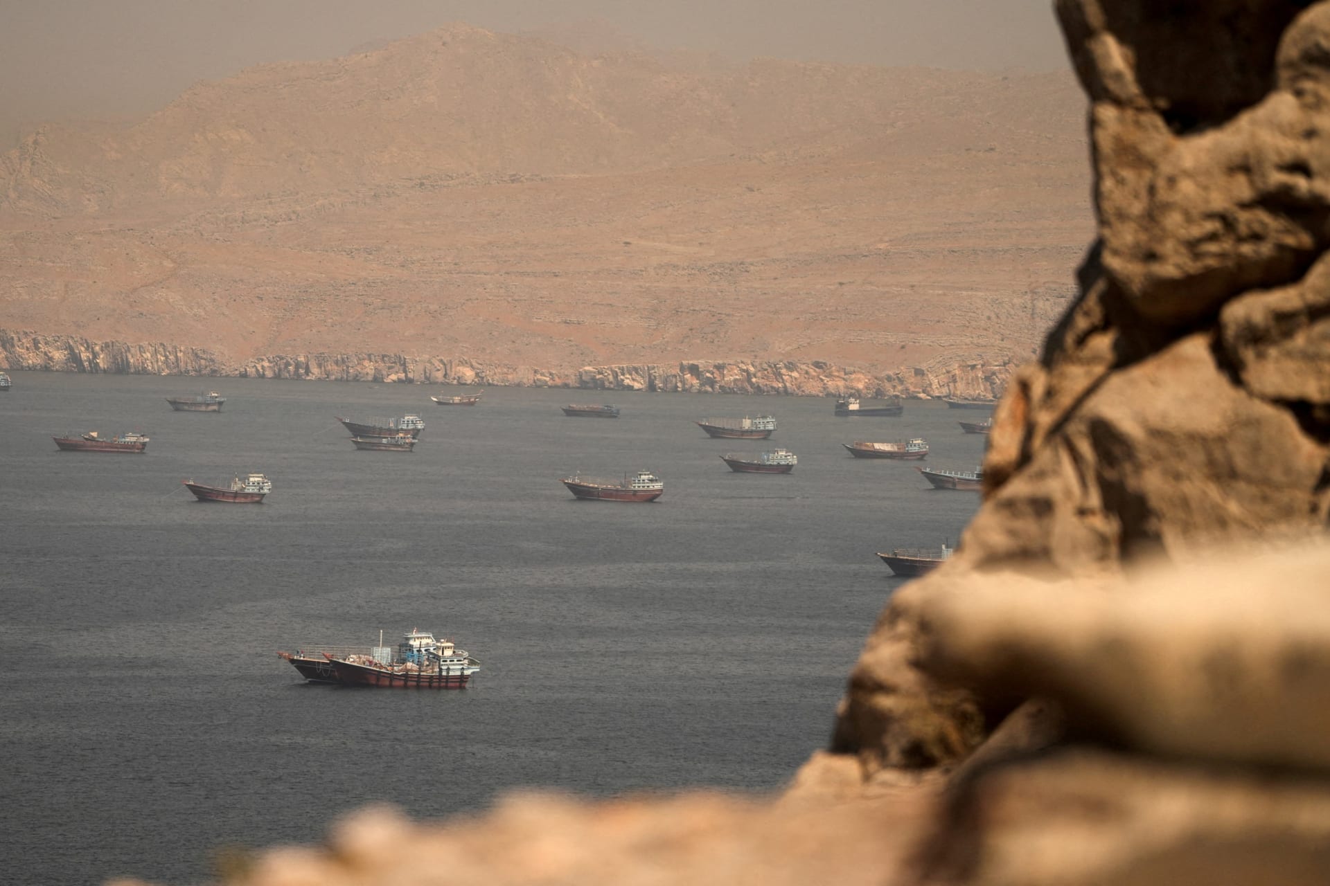 FILE PHOTO: Vessels at the Strait of Hormuz, as seen from Musandam