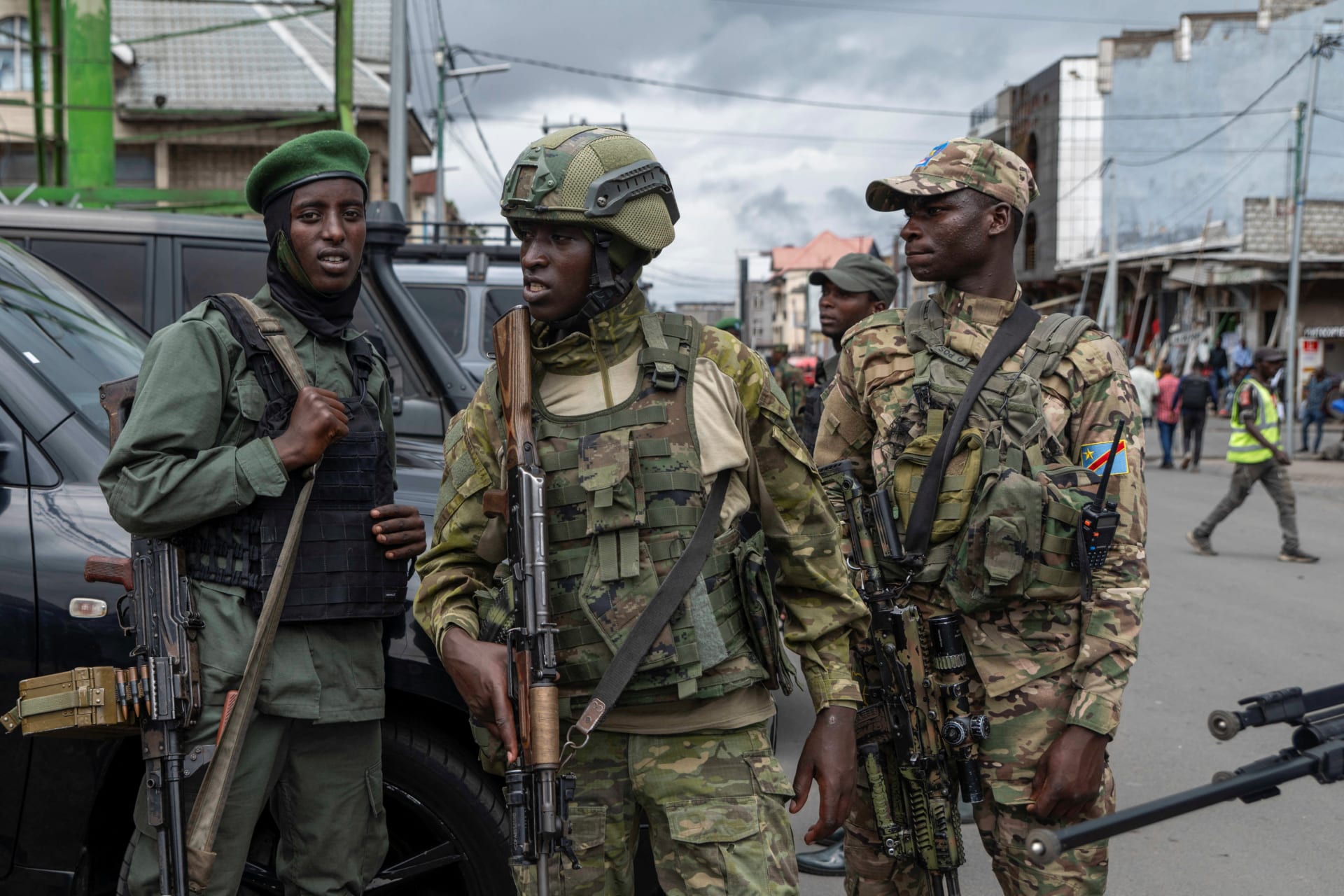 Members of the March 23 Movement rebel group attend the April 2025 opening ceremony of a bank that had been closed since the group’s takeover of Goma, Democratic Republic of Congo, in January 2025.