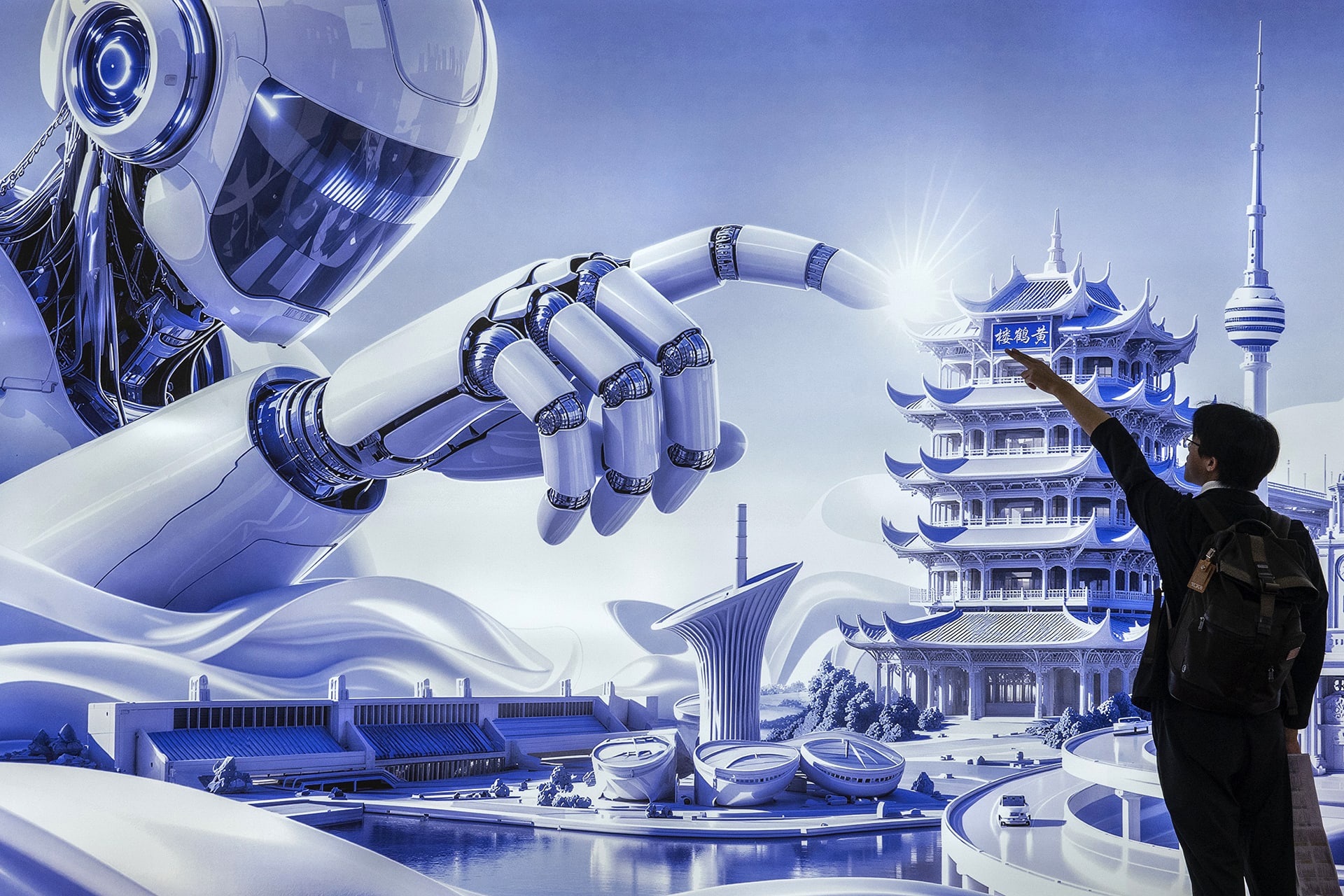 <p>A visitor poses for a friend in front of a billboard showing a humanoid robot in the AI section at the Chinese International Supply Chain Expo on June 26, 2026. in Beijing, China. </p>
