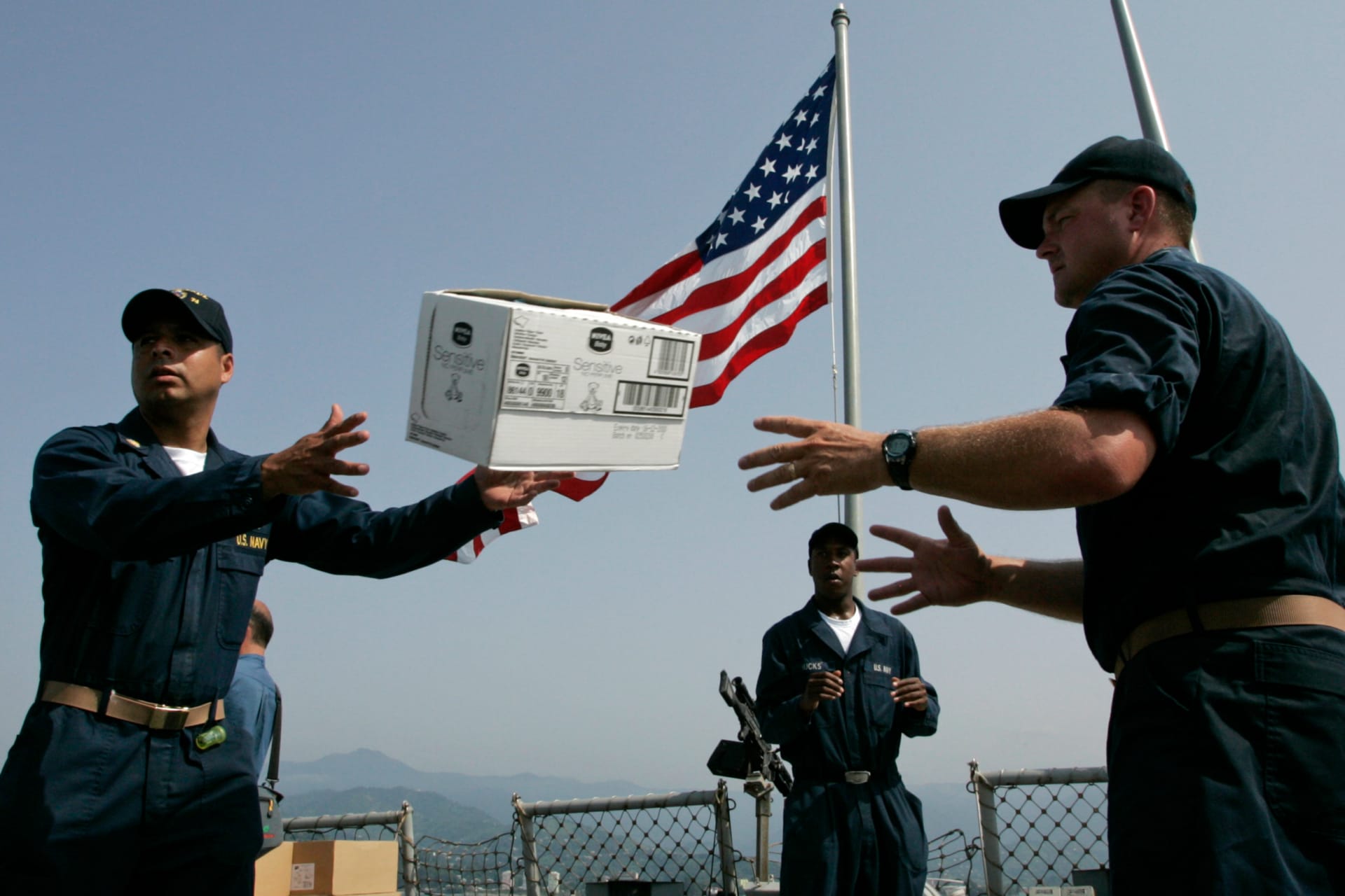 Sailors of USS McFaul unload humanitarian aid at Georgia's Black Sea port of Batumi
