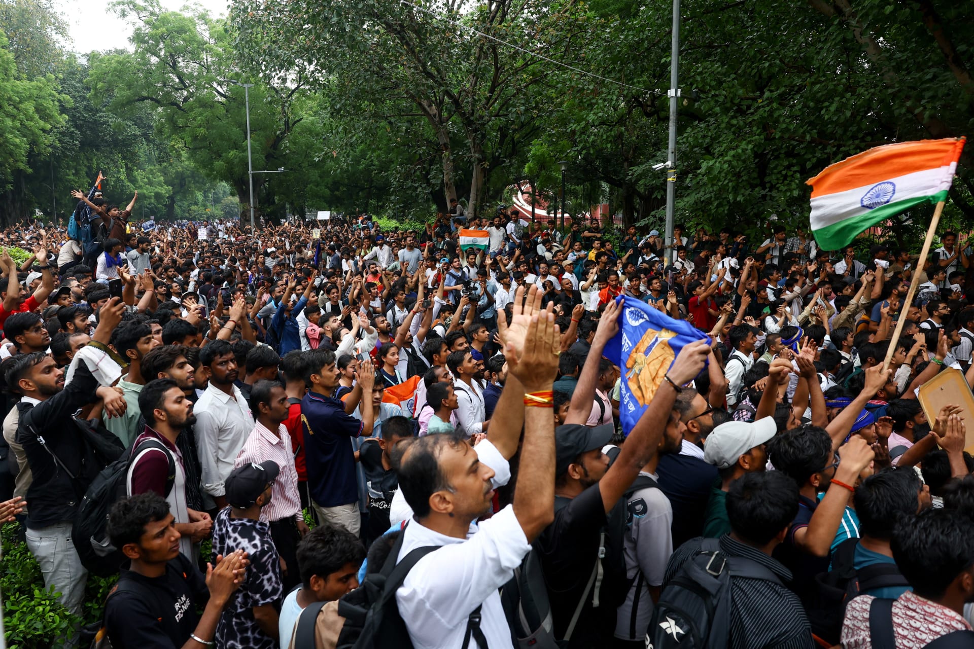 <p>People gather for a protest march on the day supporters of India’s Cockroach Janta Party demonstrate on the opening day of the Indian parliament’s monsoon session, in New Delhi, India, July 20, 2026. </p>
