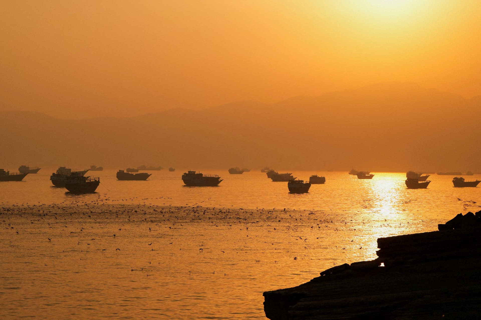 Vessels at the Strait of Hormuz, as seen from Musandam, Oman, June 16, 2026. REUTERS/Stringer