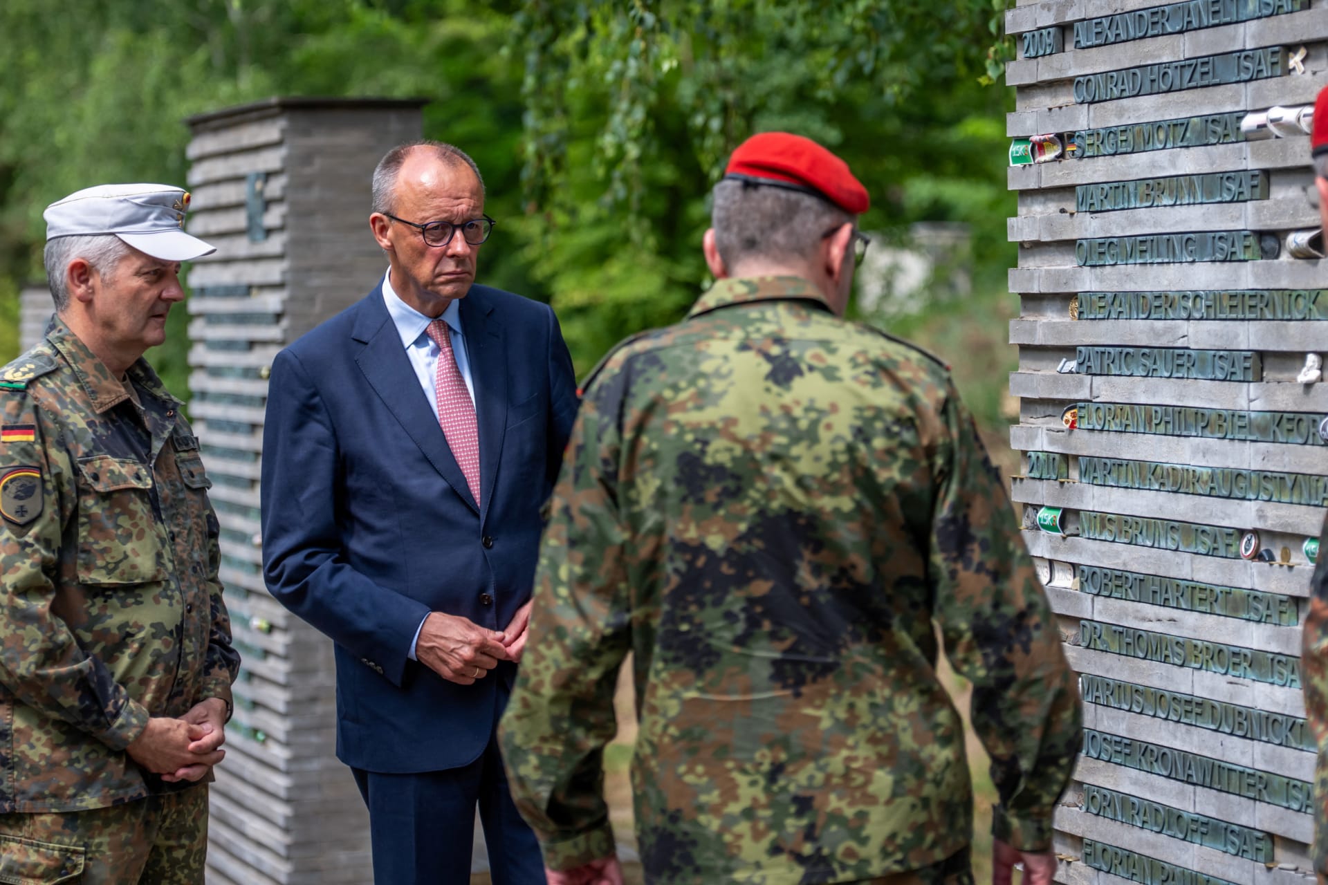<p>German Chancellor Friedrich Merz talks to soldiers in the so-called “Forest of Remembrance” following his visit to the Operational Command of the German armed forces Bundeswehr in Schwielowsee near Berlin, Germany.</p>