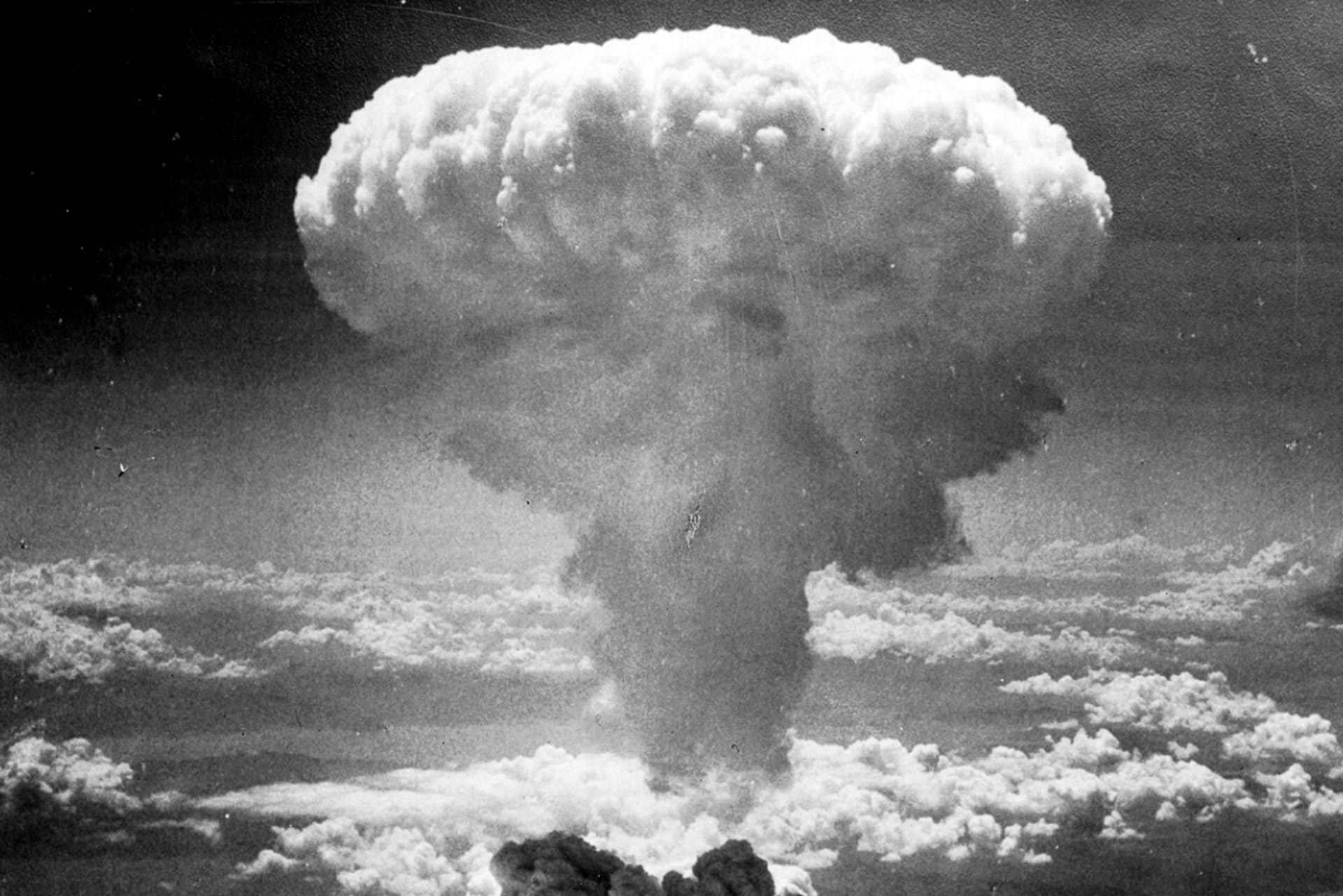<p>Smoke rises over Nagasaki after the atomic bombing, August 9, 1945.</p>