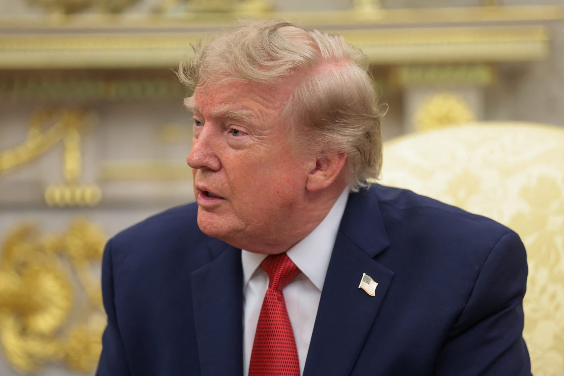 U.S. President Trump greets lifeguard Ryder Williams, who saved a child off the coast of Santa Cruz, at the White House in Washington
