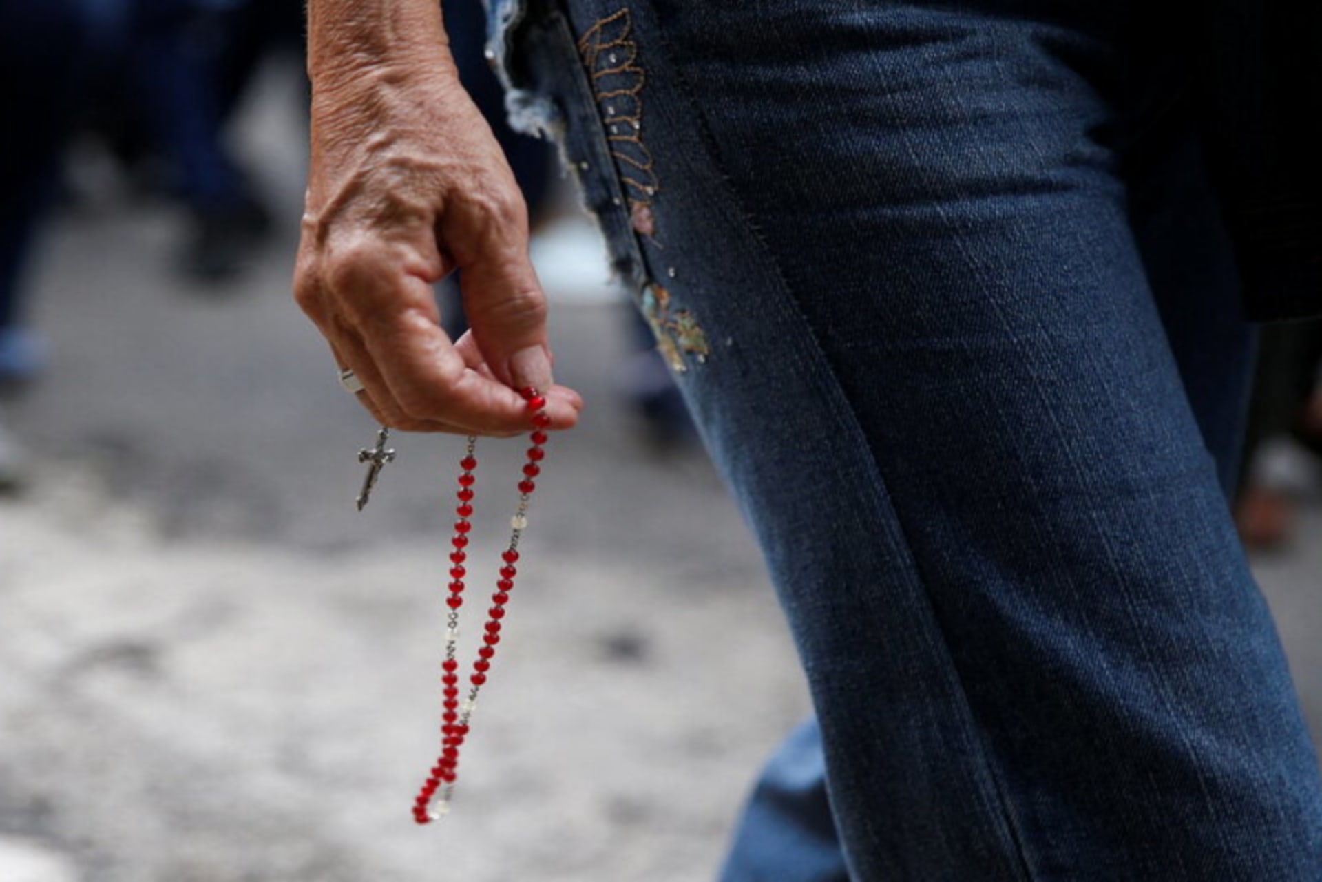 Venezuelans take part in La Divina Pastora procession, after U.S. strikes on Venezuela and the capture of President Nicolas Maduro, in Caracas