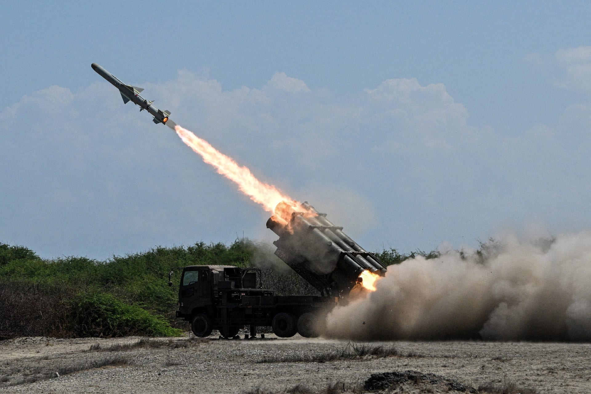 A Japan Ground Self-Defense Force (JGSDF) Type 88 surface-to-ship missile launcher fires during the Joint Task Force (JTF) Maritime Strike, part of Balikatan, the annual joint military exercises between the United States and the Philippines, at Culili Point Sand Dunes, Paoay, Ilocos Norte province, Philippines, on May 6, 2026. 