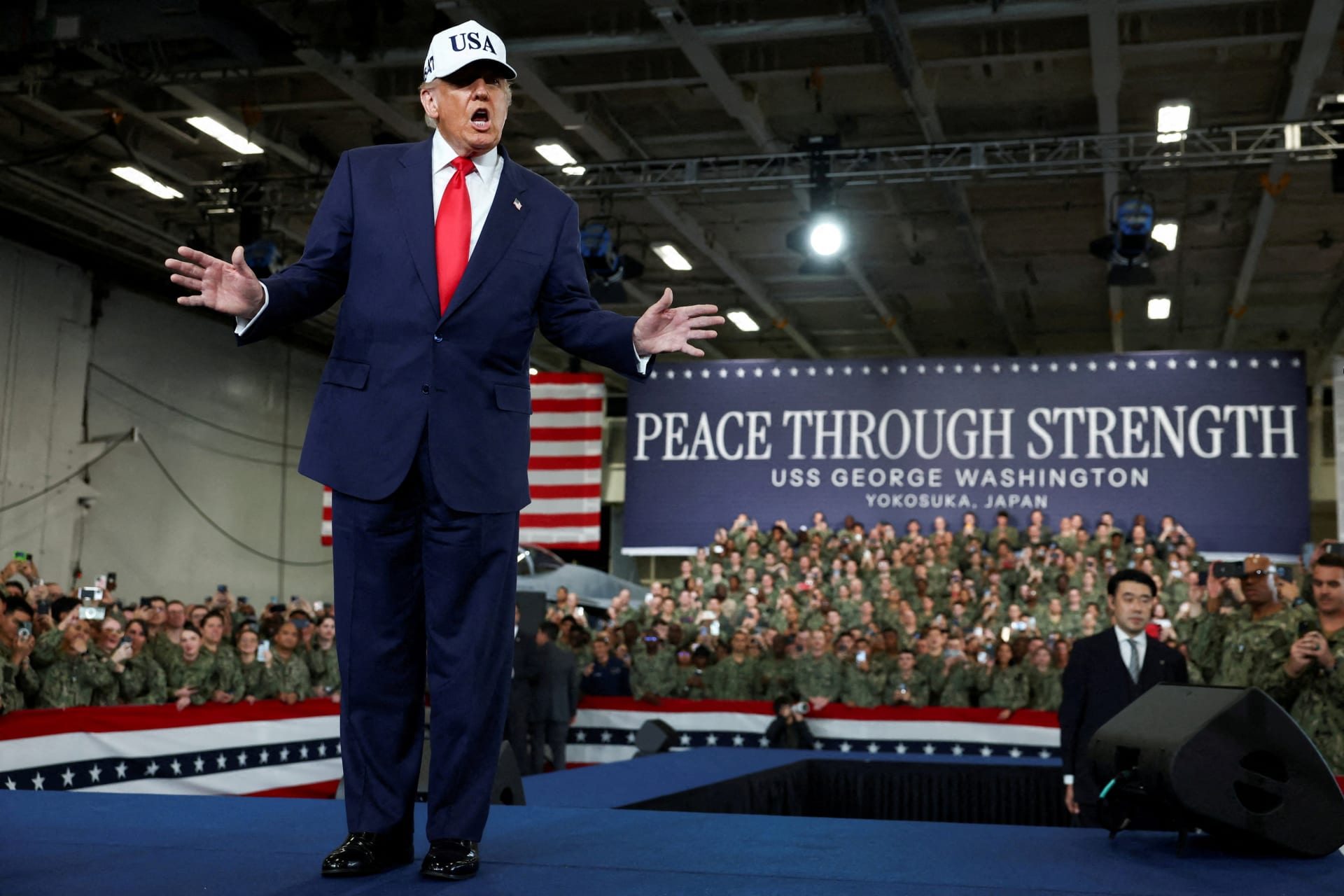 FILE PHOTO: U.S. President Donald Trump visits the aircraft carrier USS George Washington at Commander, Fleet Activities Yokosuka Navy base in Yokosuka