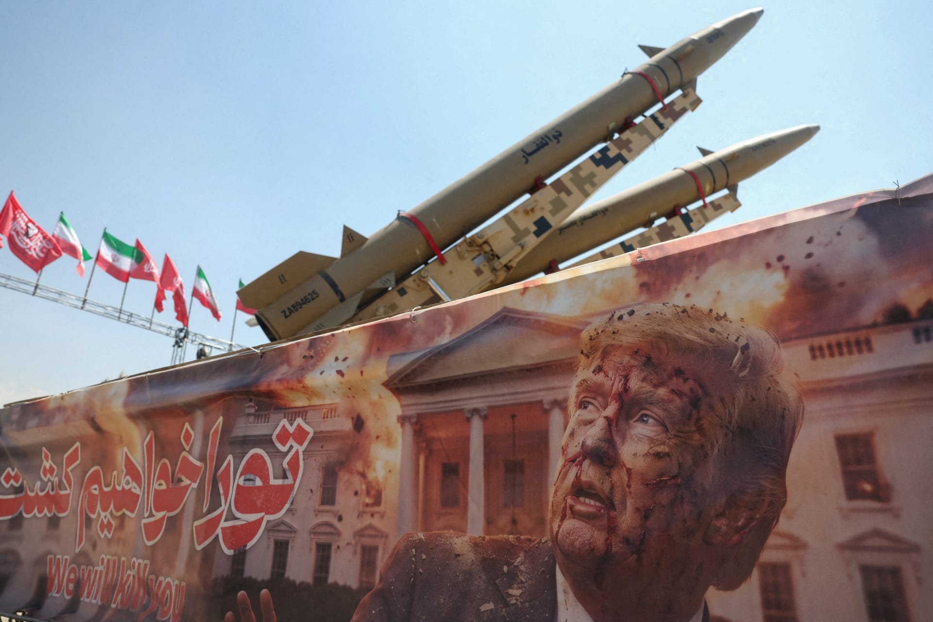 <p>A banner with a picture of President Donald Trump next to an Iranian missile system at Azadi Square in Tehran, Iran, July 30, 2026.</p>
