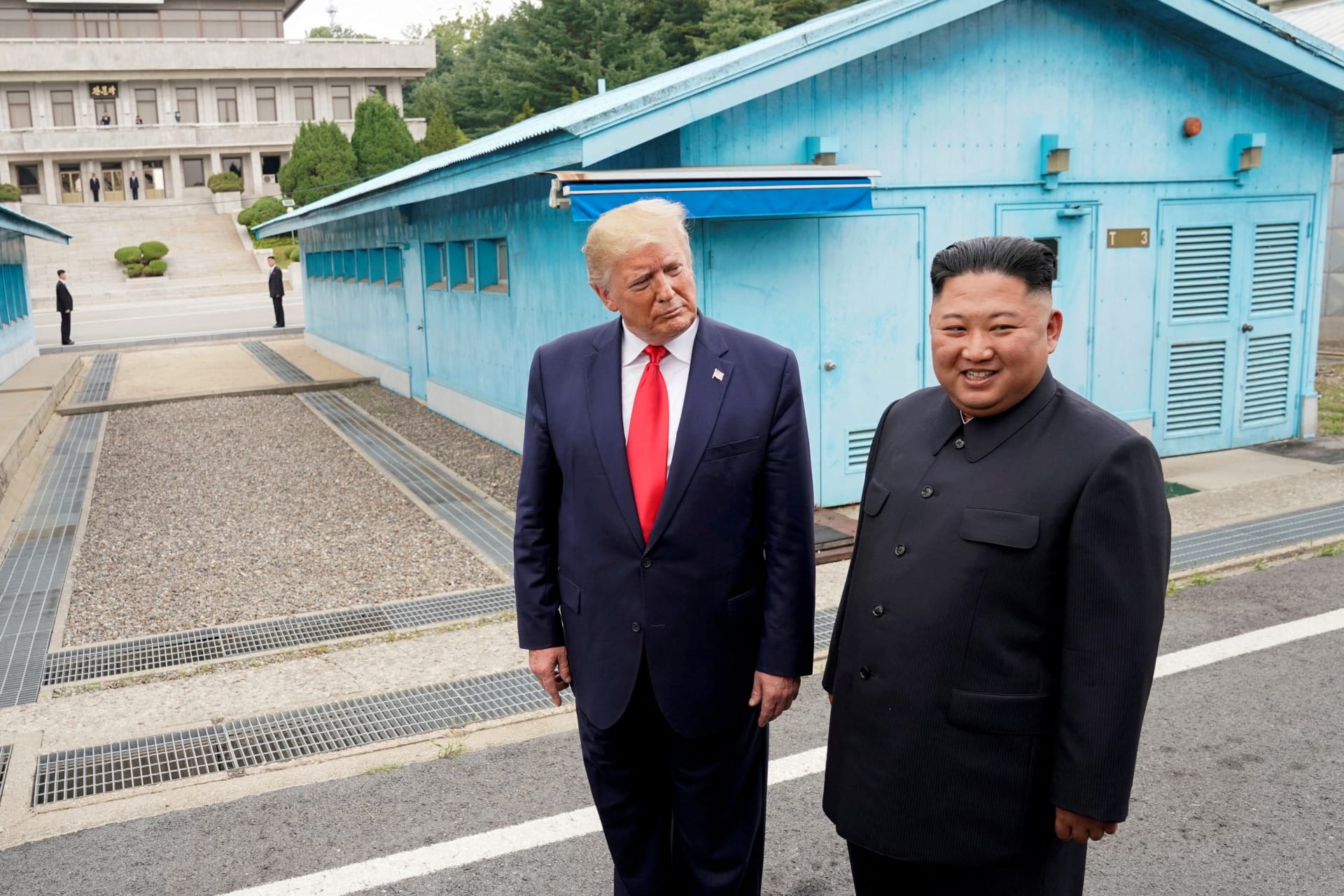 FILE PHOTO: Trump meets with North Korean leader Kim Jong Un at the DMZ on the border of North and South Korea