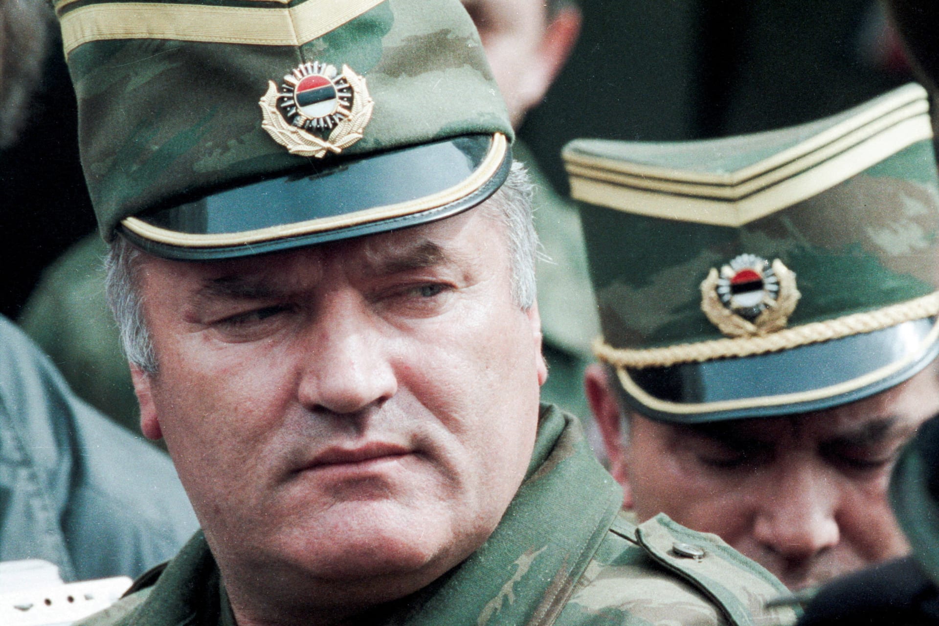 FILE PHOTO: Bosnian Serb General Ratko Mladic leaves a meeting at the airport in Sarajevo