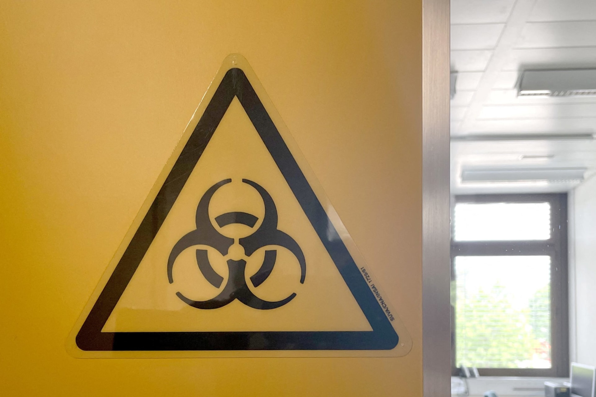 <p>A biohazard sign is displayed in the biocontainment facility of the Spiez Laboratory, in Spiez, Switzerland, on June 8, 2022.</p>