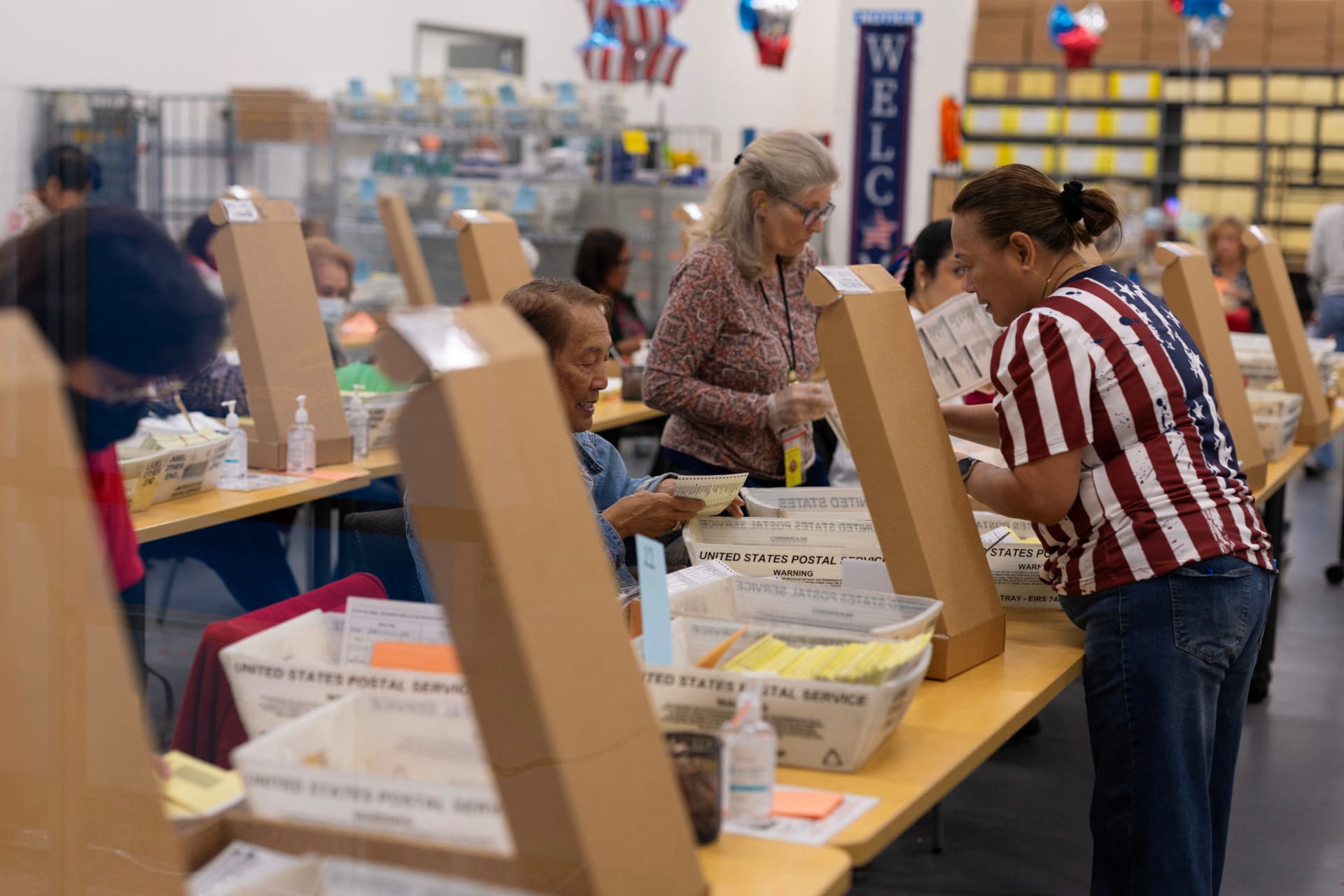 <p>Election workers extract mail-in ballots at the registrar of voters’ office during the California primary election in San Diego, California, June 2, 2026.</p>
