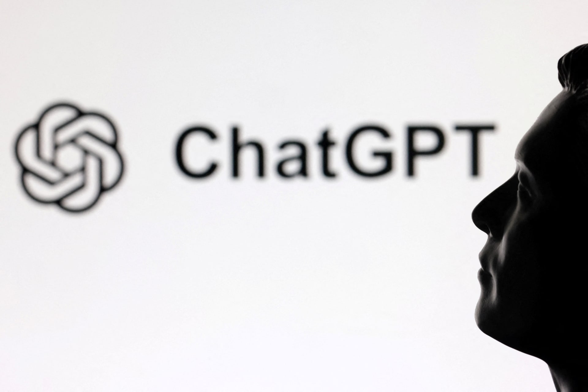 A 3D-printed miniature model of Elon Musk and ChatGPT logo are seen in this illustration taken, February 11, 2025.