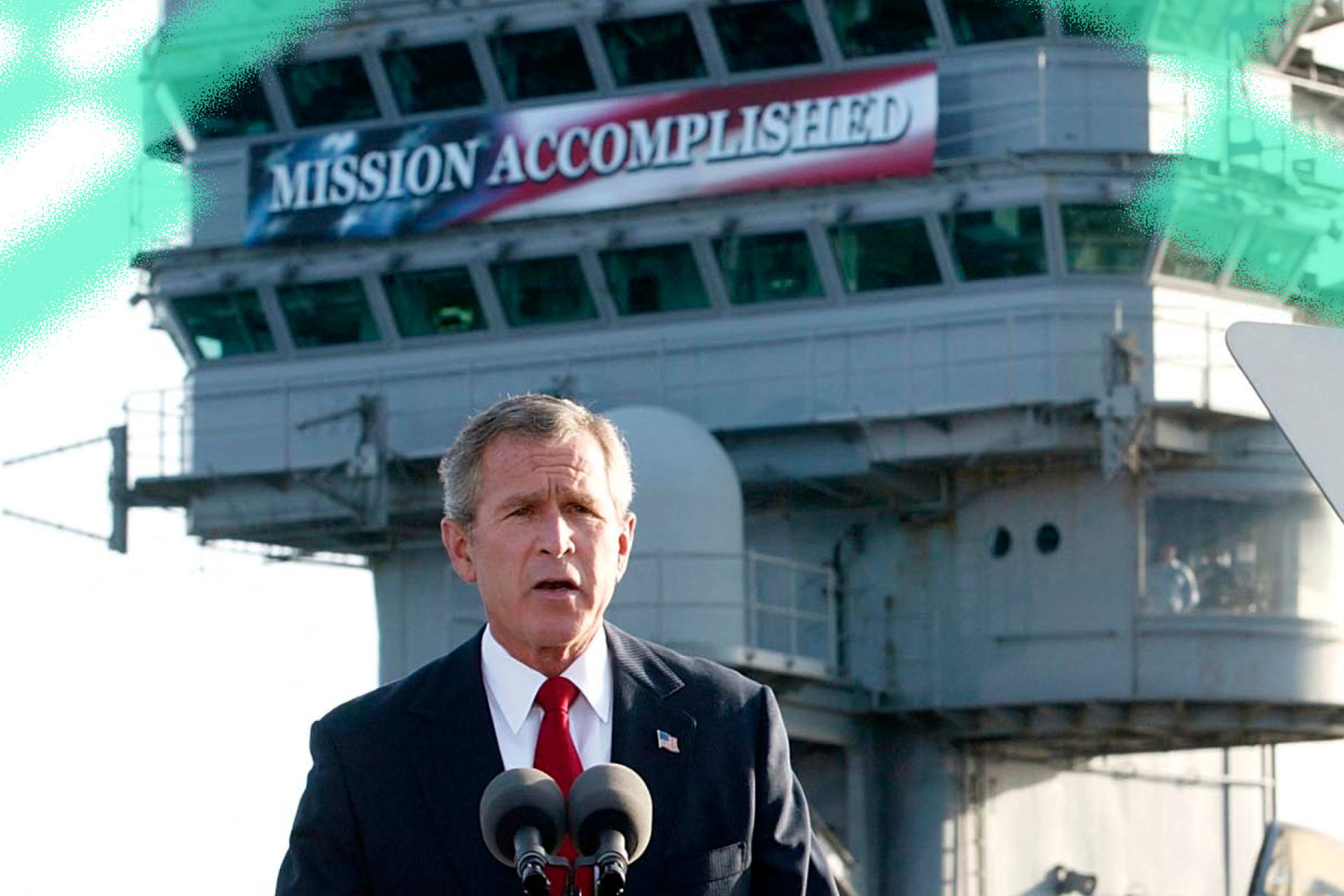 U.S. President George W. Bush addresses the nation aboard the nuclear aircraft carrier USS Abraham Lincoln on May 1, 2003.