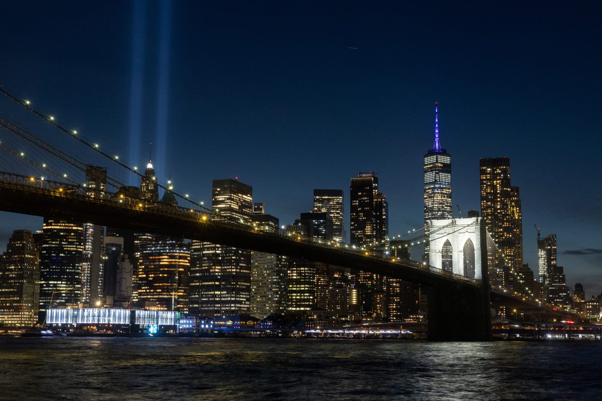 <p>The “Tribute in Light” installation is illuminated over the lower Manhattan skyline ahead of the twenty-fifth anniversary of the September 11, 2001, attacks on the World Trade Center, as viewed from Brooklyn, New York, September 8, 2026.</p>
