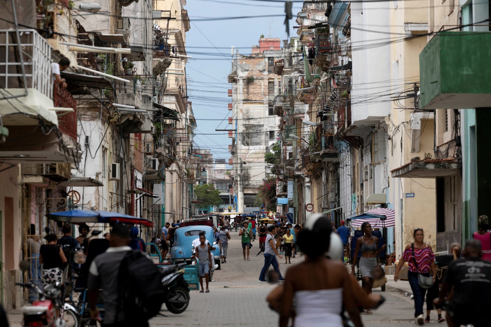 A man pushing a handcart in Havana, Cuba, July 2026