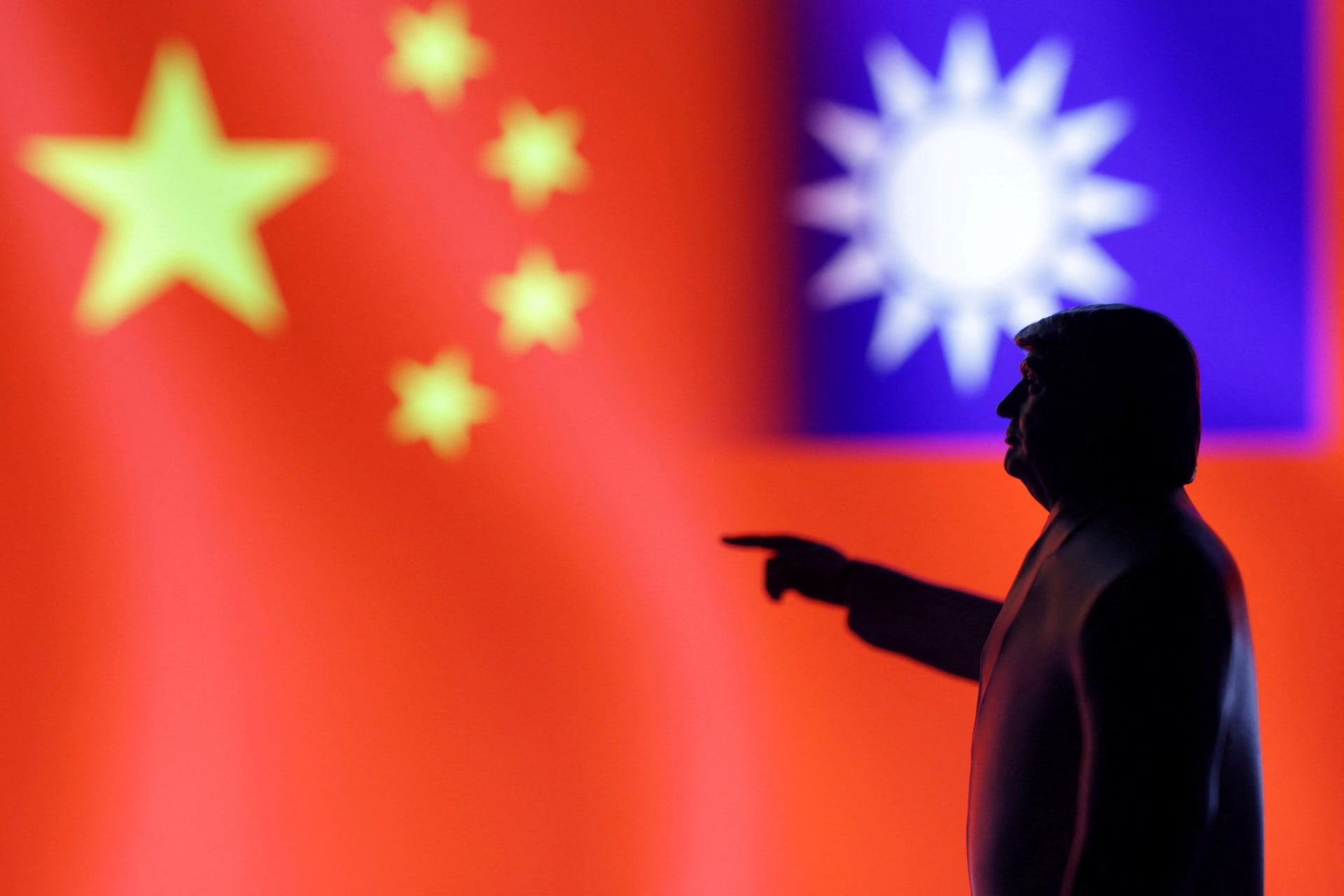 <p>A 3D-printed miniature model depicting U.S. President Donald Trump, Chinese flag and fragment of Taiwanese flag in this illustration taken, April 17, 2025.</p>