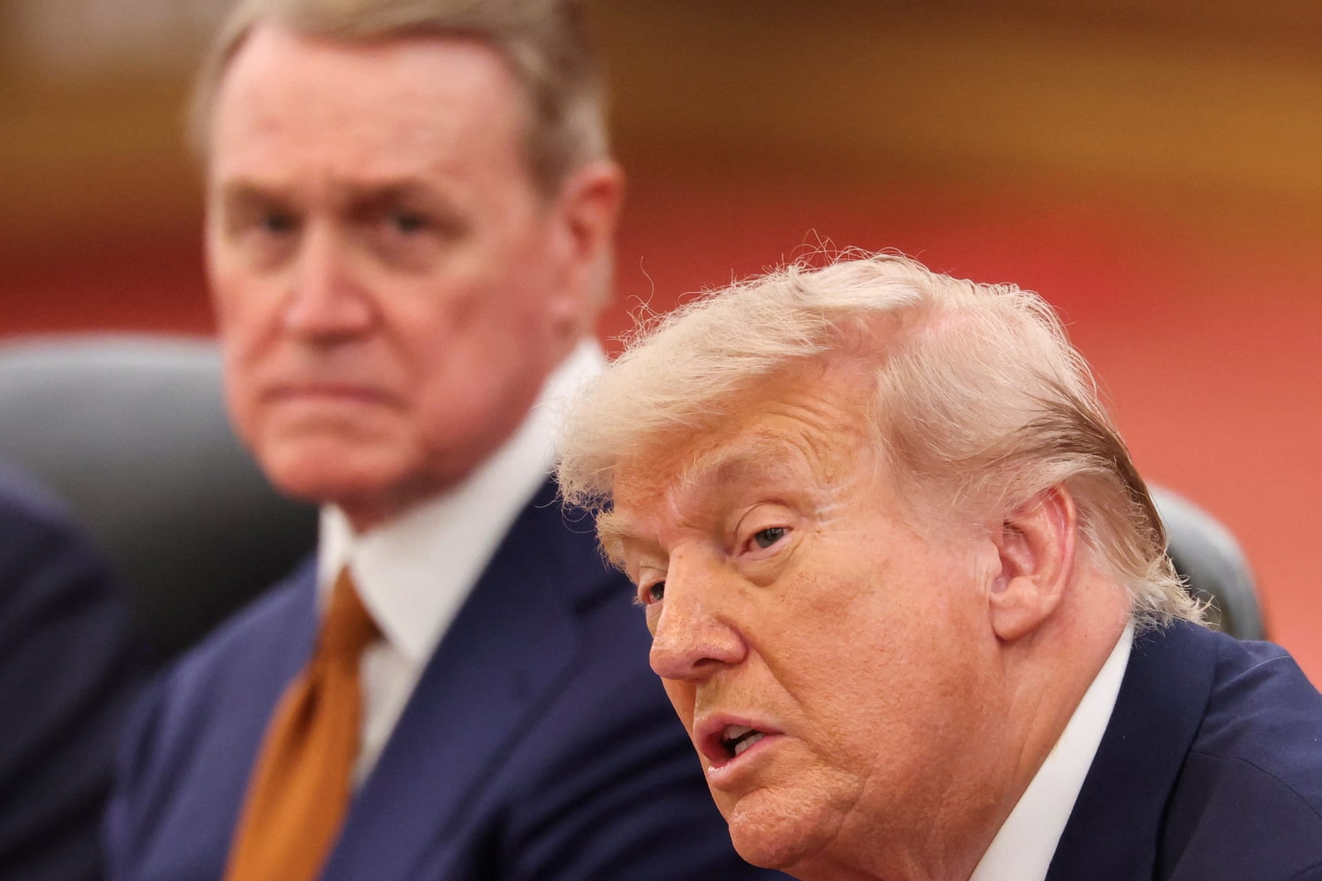 <p>U.S. President Donald Trump, seated next to U.S. Ambassador to China David Perdue, attends a bilateral meeting with Chinese President Xi Jinping (not pictured) at the Great Hall of the People, in Beijing, China May 14, 2026.</p>
