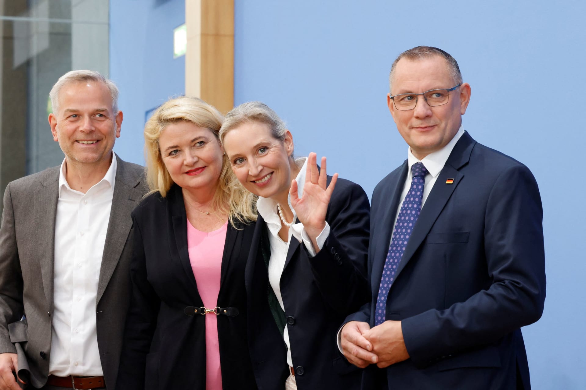 Alternative for Germany (AfD) top candidate for Berlin, Kristin Brinker, AfD top candidate for Mecklenburg-Western Pomerania, Leif-Erik Holm, AfD co-leader Alice Weidel and AfD co-leader Tino Chrupalla react after state elections at the Federal Press Conference building, in Berlin, Germany, September 21, 2026.