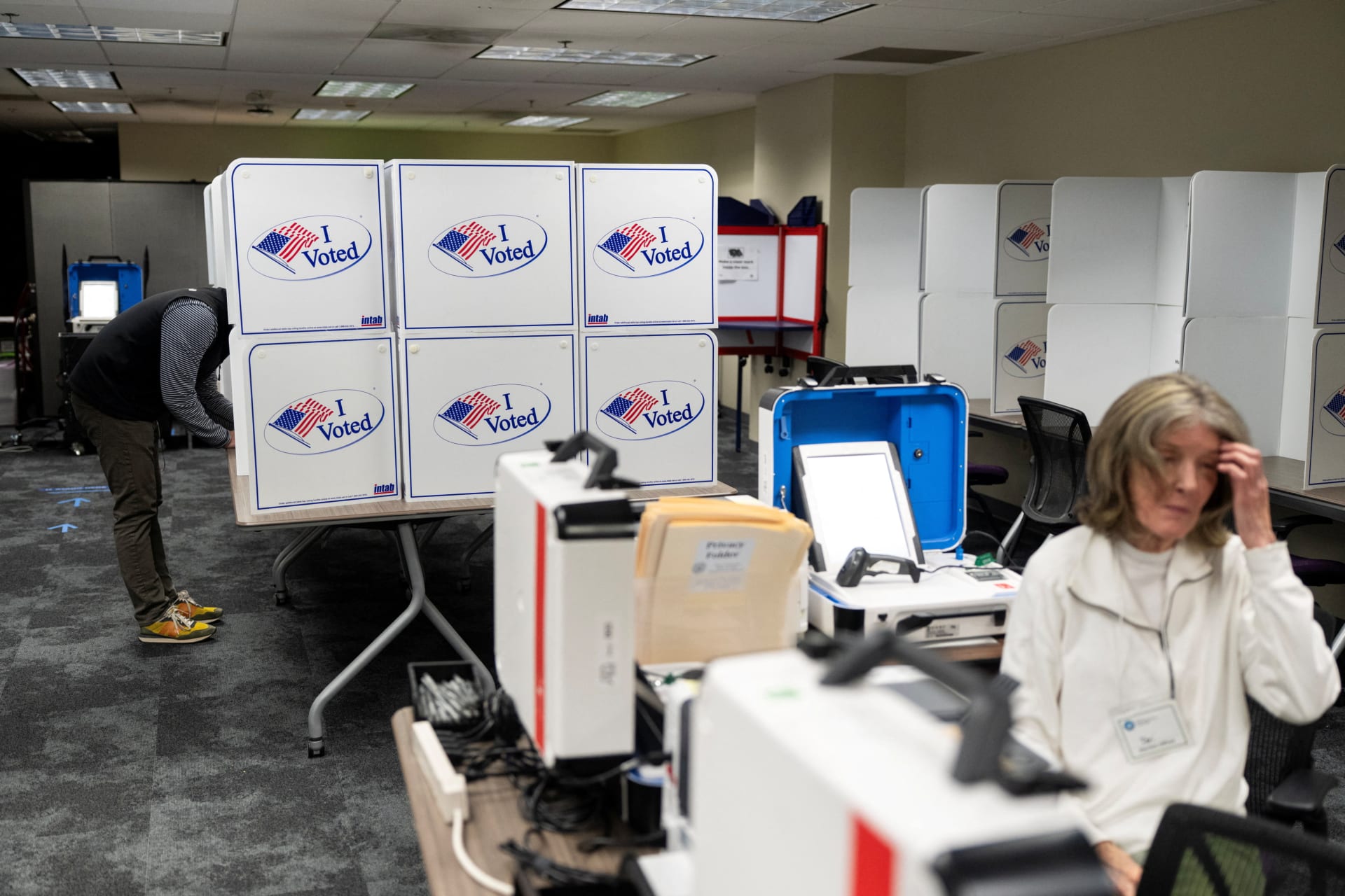 <p>A person votes during early voting at the Alexandria City Registrar Office in Alexandria, Virginia, US, October 7, 2026.</p>
