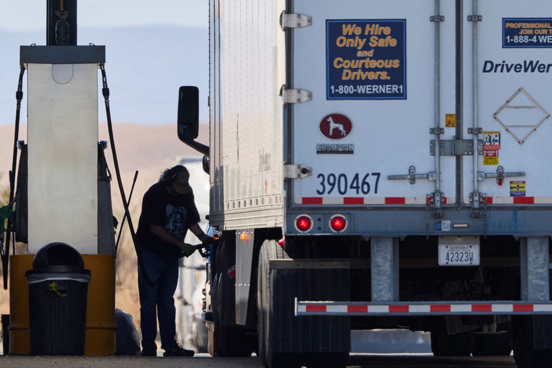 A driver fills his semi with diesel at a truck stop in Dunnigan, California, September 28, 2026.