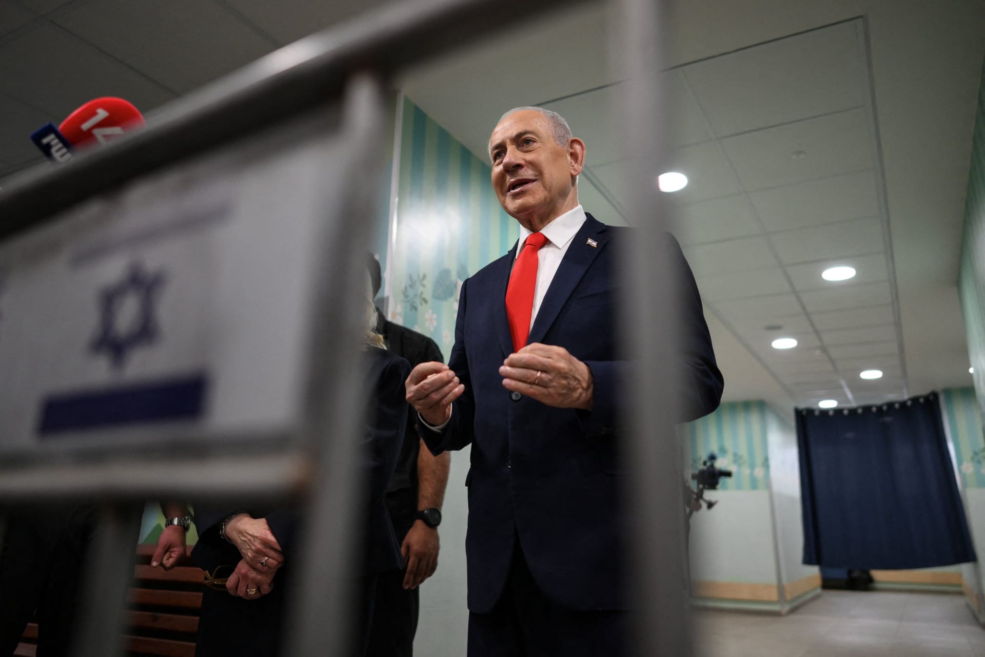 Israel's Prime Minister Benjamin Netanyahu speaks to the media after voting at a polling station in Jerusalem, Israel, on the day of Israel's legislative election, October 27, 2026.