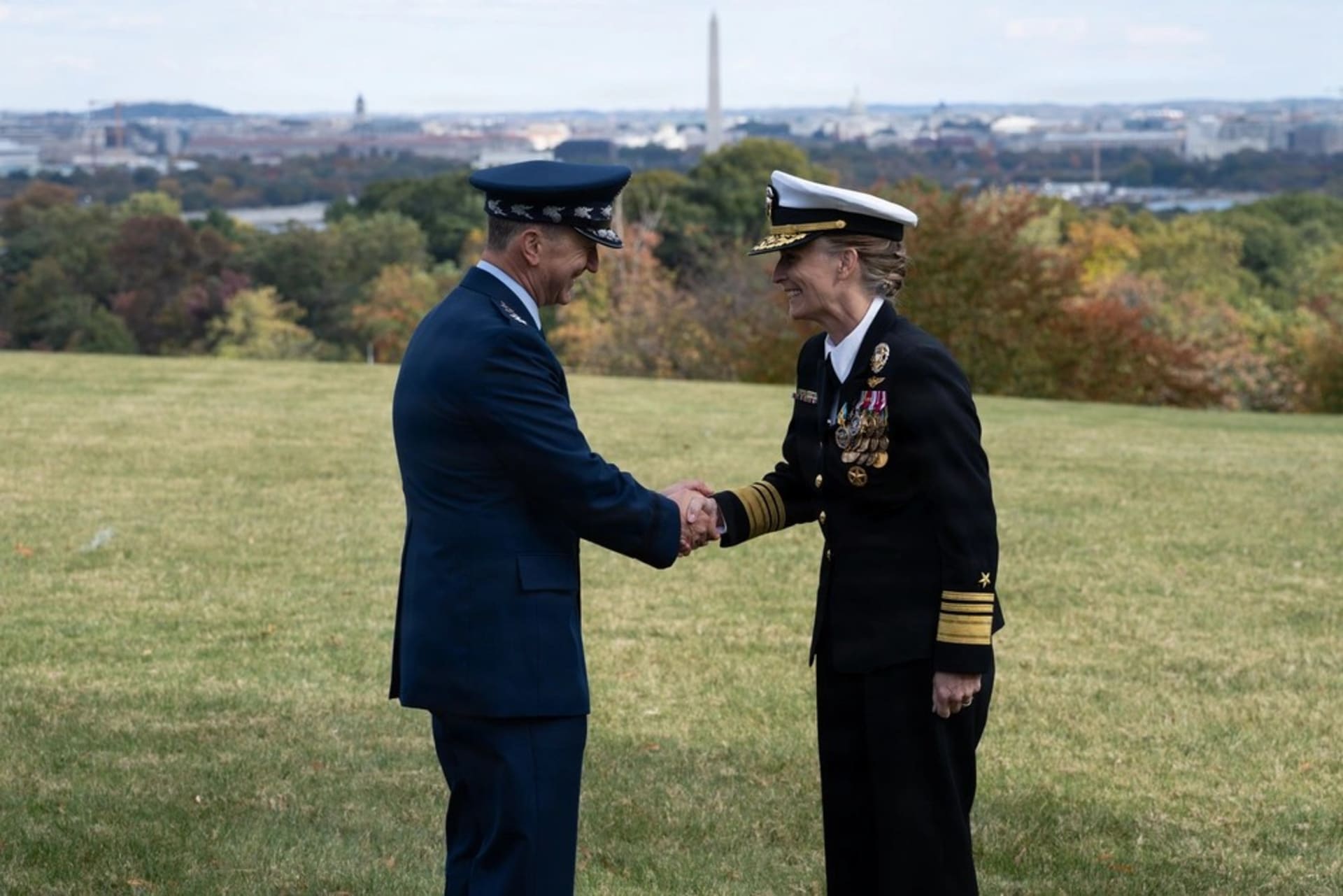 Admiral Joyner retirement ceremony shaking hands