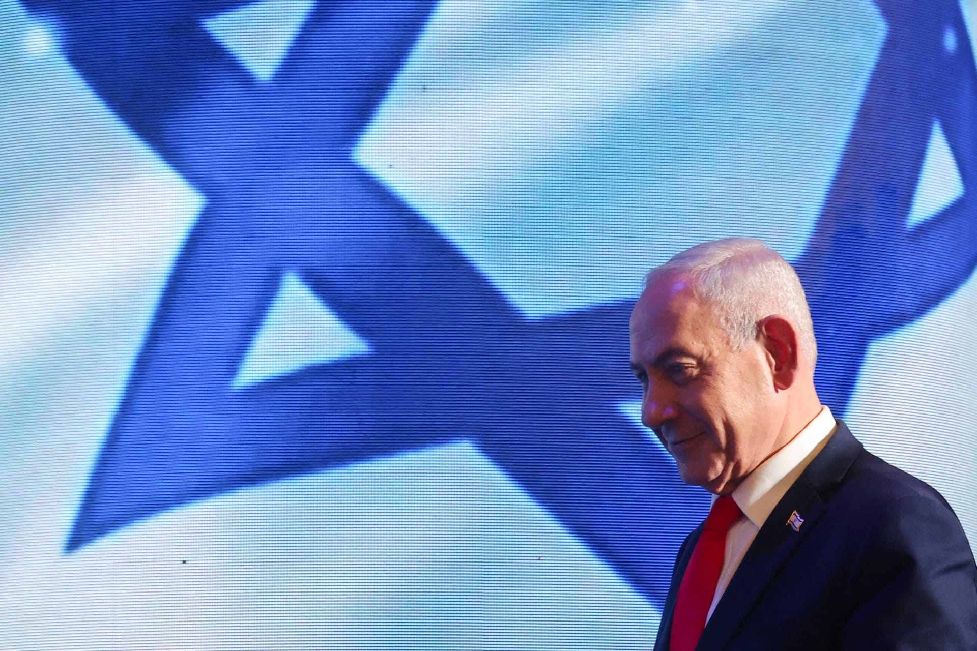 Israeli Prime Minister and Likud party leader Benjamin Netanyahu walks following exit polls for Israel's national election, at Likud's election headquarters in Jerusalem, October 28, 2026.