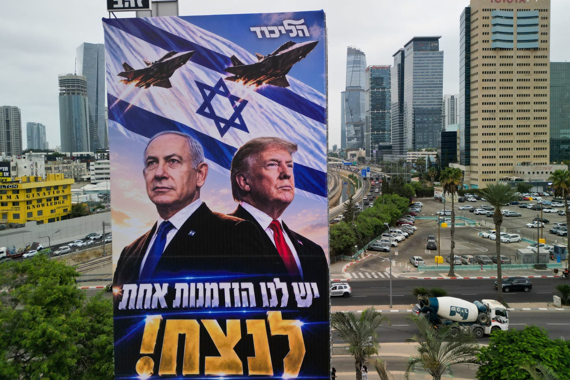 A drone view of an election campaign display for Israeli Prime Minister Benjamin Netanyahu's Likud party, depicting Netanyahu and US President Donald Trump with the words in Hebrew "we have one opportunity to win!", the day before Israel's national election, in Tel Aviv, Israel, October 26, 2026.
