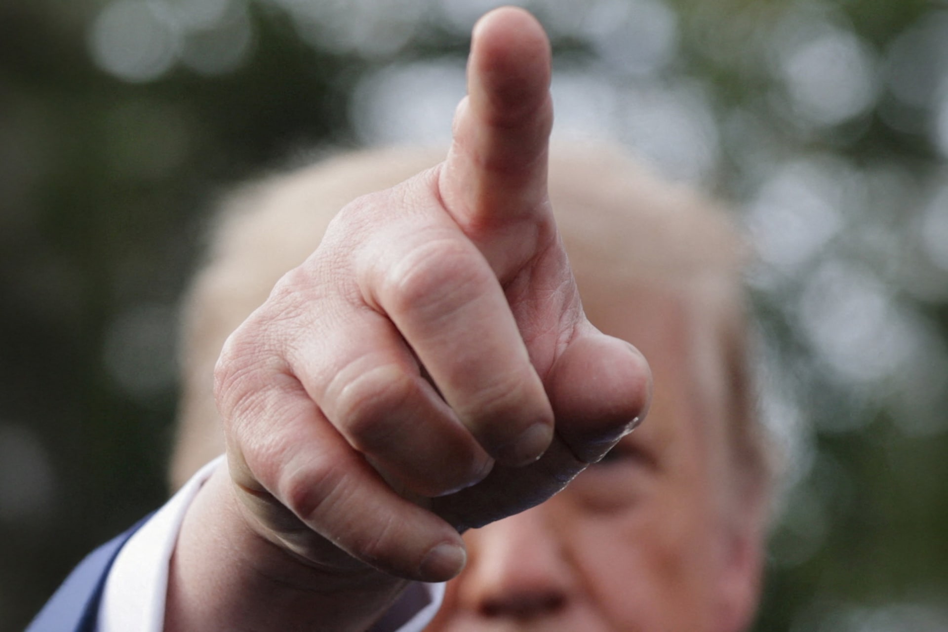 US President Donald Trump speaks to the media at the White House driveway following a luncheon for tech leaders in the East Room, in Washington.
