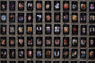 <p>Photos of fentanyl victims shown at the U.S. Drug Enforcement Administration headquarters. </p>