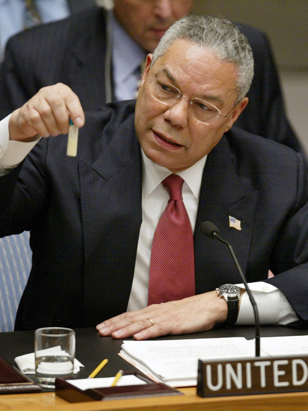 Secretary of State Colin Powell displays a vial like ones that he says Iraq uses to hold anthrax. Ray Stubblebine/Reuters