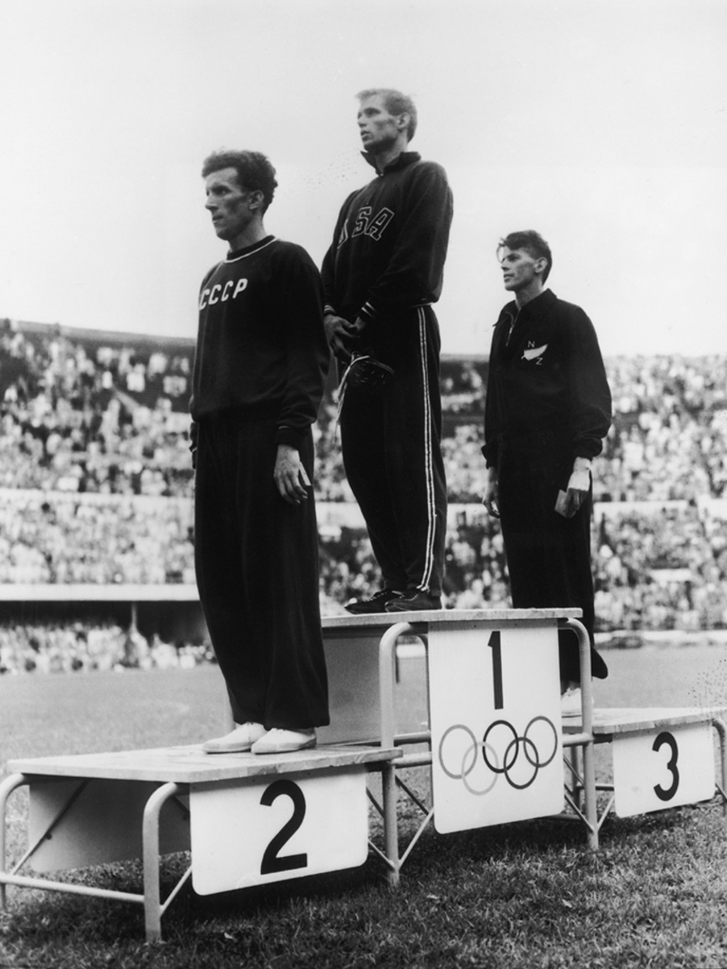 The Soviet Union’s Yuri Lituev (left) wins a silver medal in Helsinki, Finland. Keystone/Hulton Archive/Getty Images