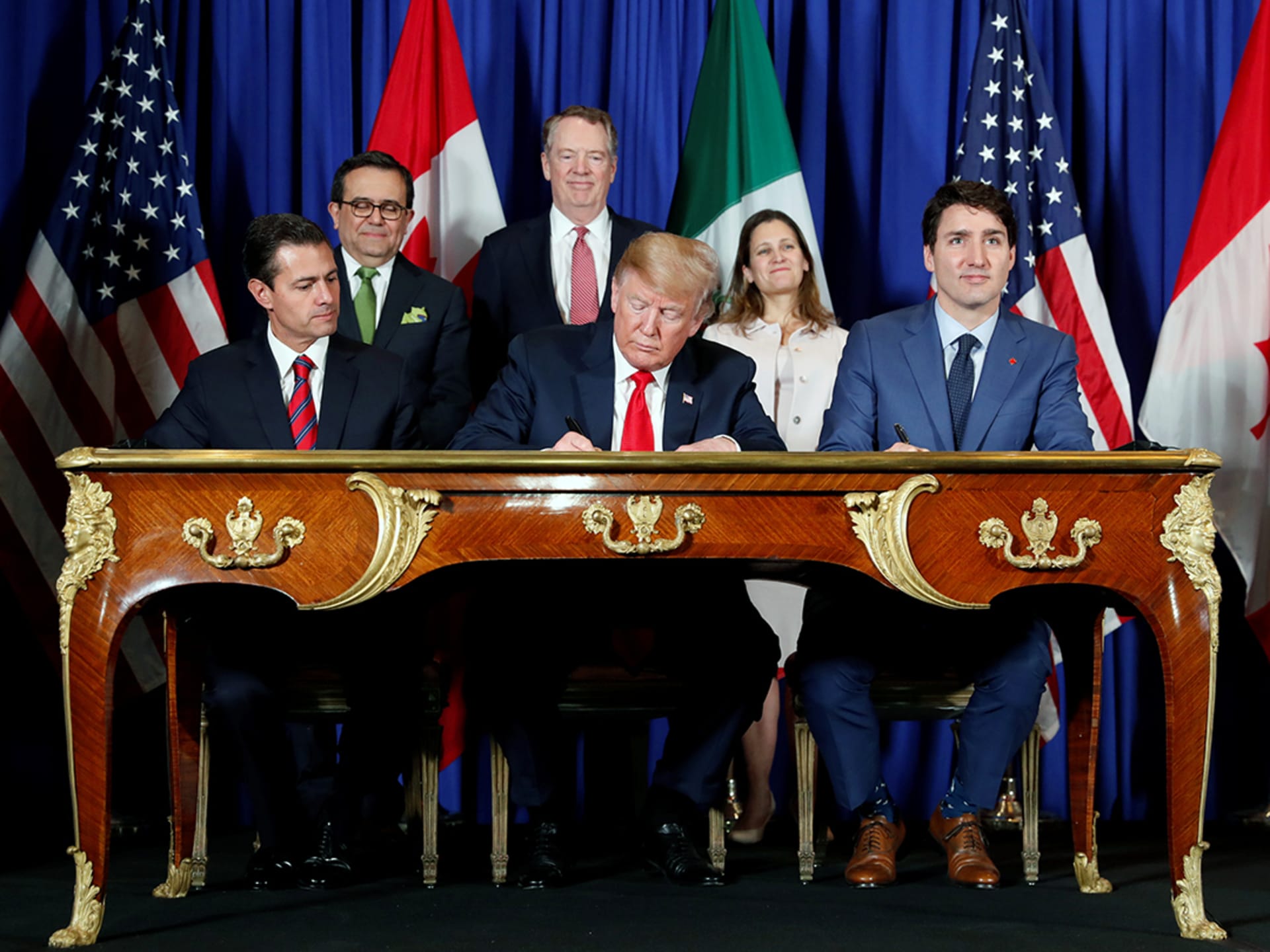 The leaders of Mexico, the United States, and Canada attend the USMCA signing ceremony in Buenos Aires, Argentina, ahead of the 2018 G20 Leaders’ Summit. Kevin Lamarque/Reuters