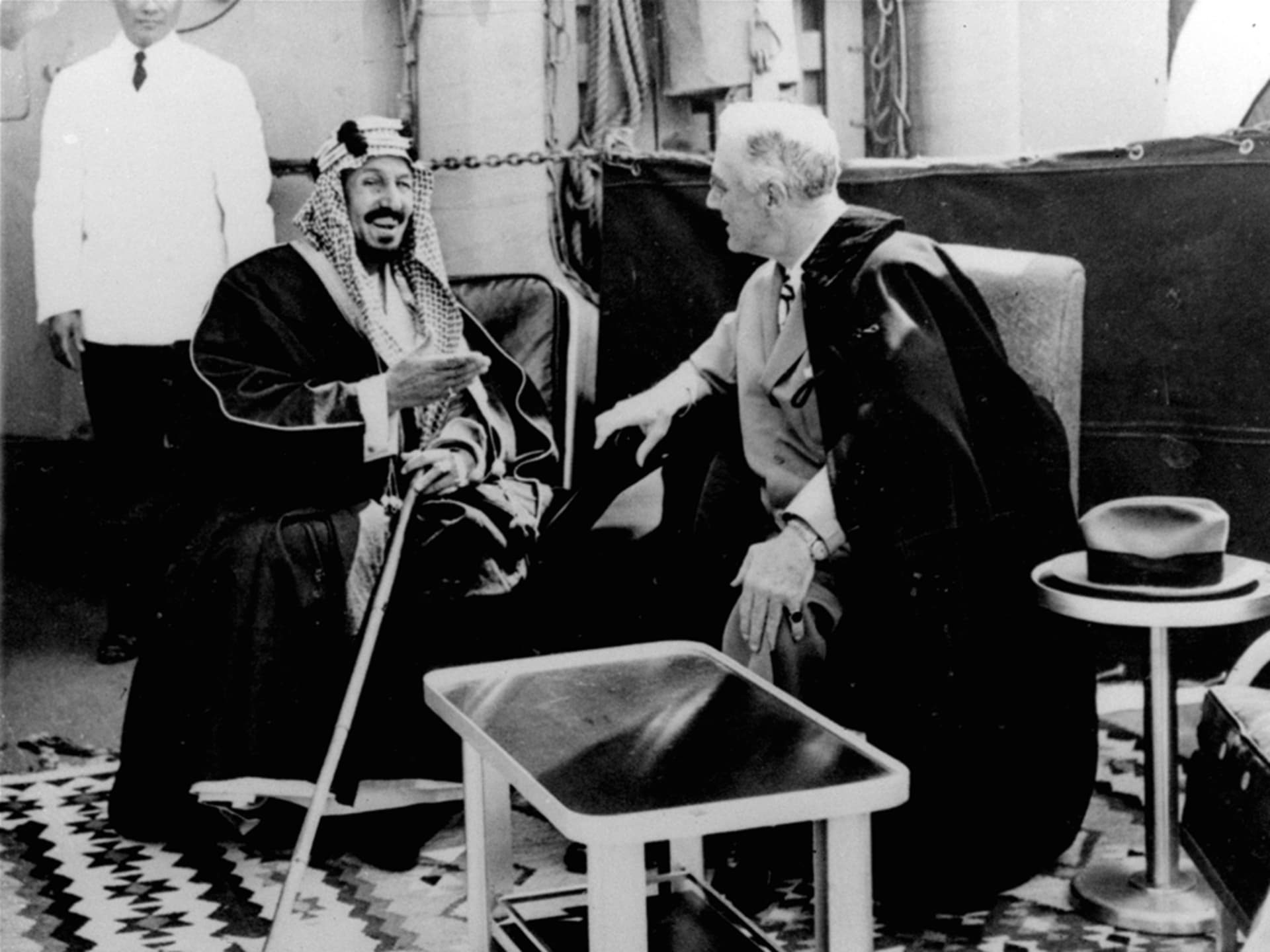 U.S. President Franklin D. Roosevelt and King Abdul Aziz Ibn Saud in discussion aboard the USS Quincy north of Suez, Egypt, on February 14, 1945. 
