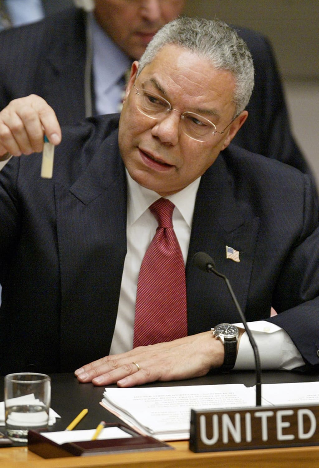 Secretary of State Colin Powell displays a vial like ones that he says Iraq uses to hold anthrax. Ray Stubblebine/Reuters