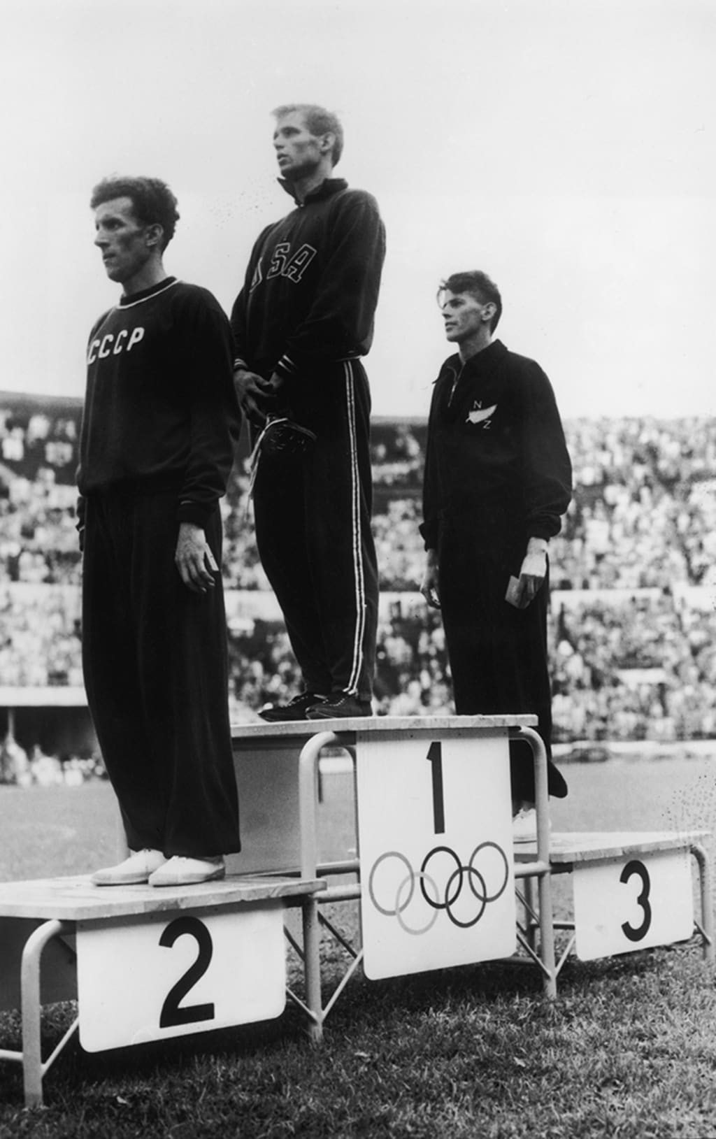 The Soviet Union’s Yuri Lituev (left) wins a silver medal in Helsinki, Finland. Keystone/Hulton Archive/Getty Images