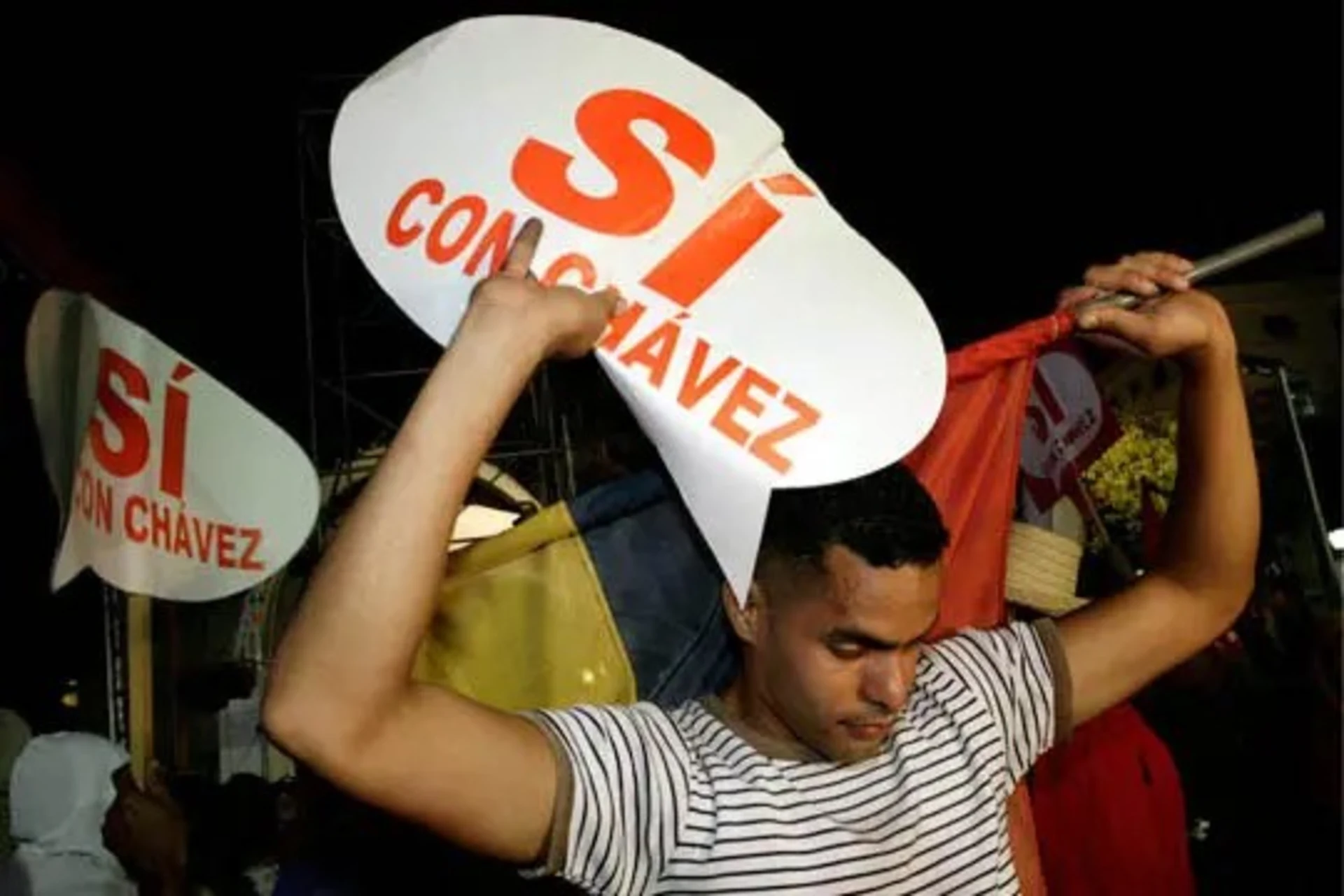 A Chavez supporter outside the Miraflores presidential palace in.