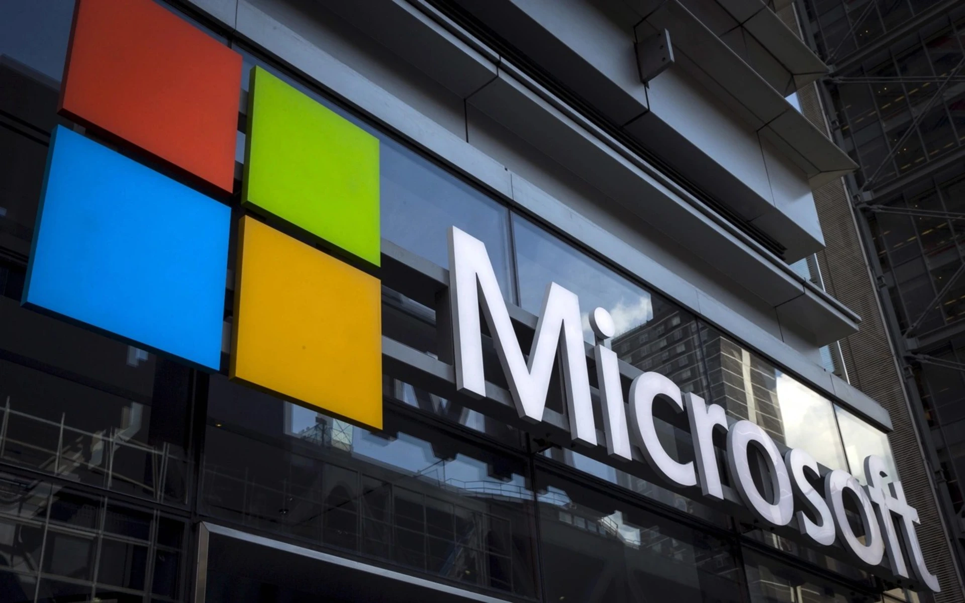A Microsoft logo is seen on an office building in New York City.

