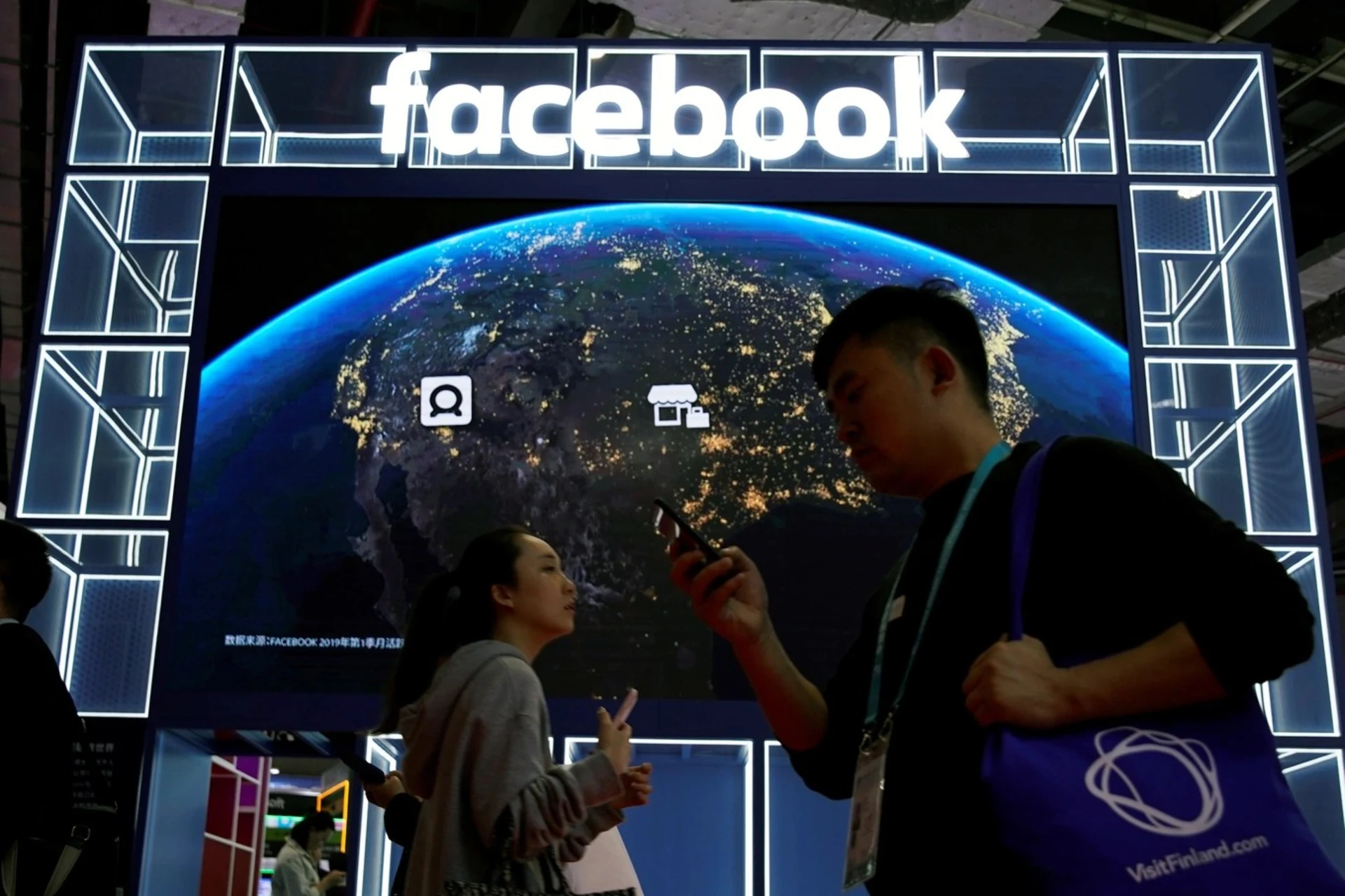 A Facebook sign is seen at the second China International Import Expo. 