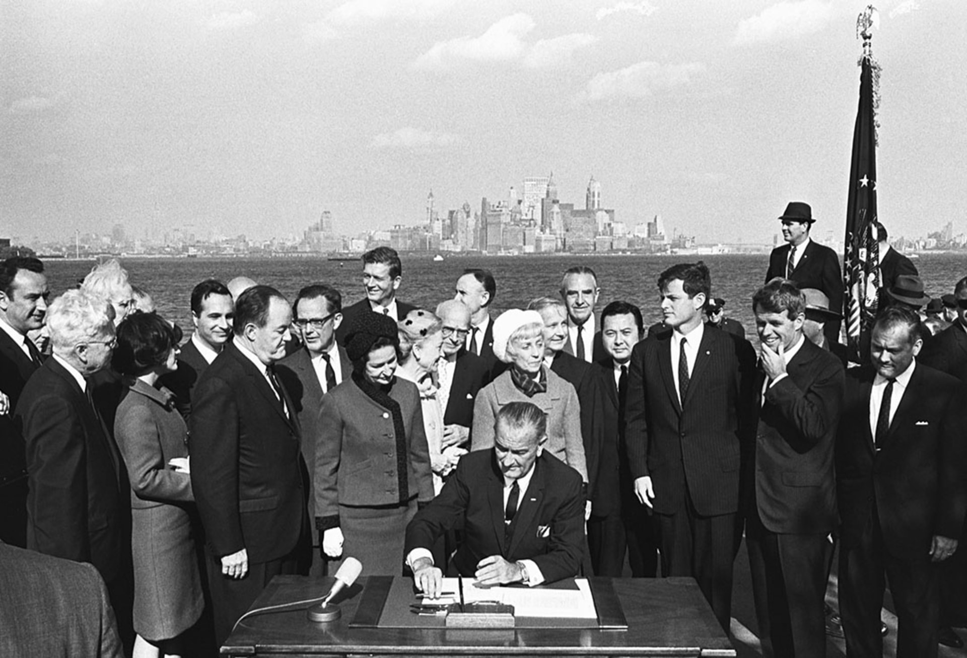 President Lyndon B. Johnson signs the 1965 Immigration Act at the foot of the Statue of Liberty. Yoichi Okamoto/Corbis/Getty Images