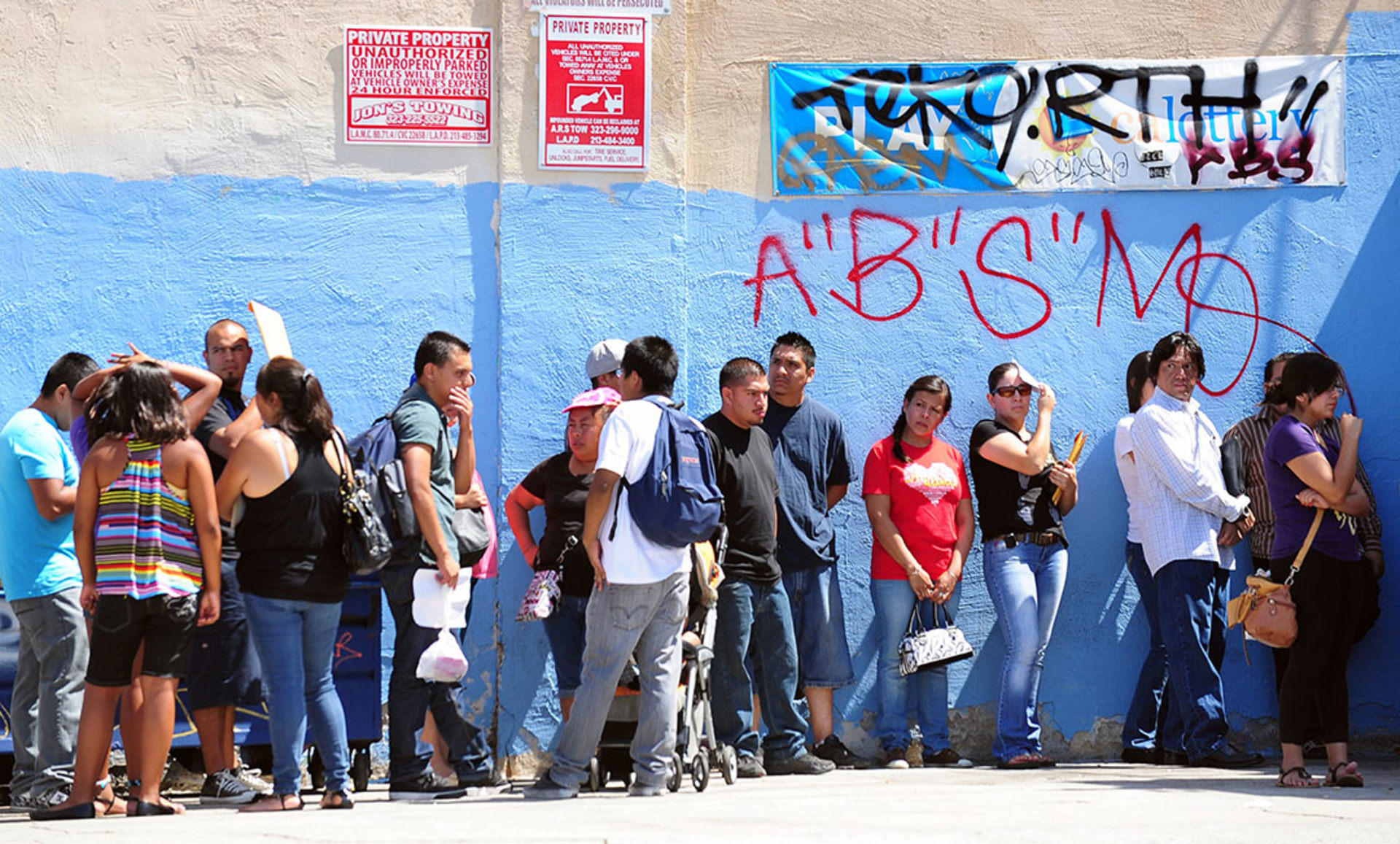 People wait in line to enter the Coalition for Humane Immigrant Rights of Los Angeles office on the first day of the DACA program. Frederic J. Brown/AFP/Getty Images